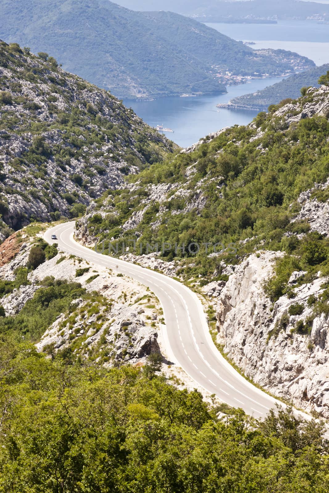 Aerial view on hairpin road to Risan. Montenegro. In background bay of Kotor.