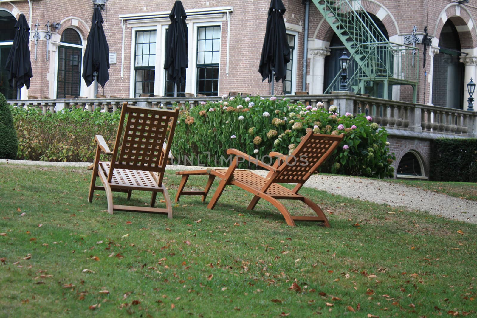 Wooden deckchairs by studioportosabbia