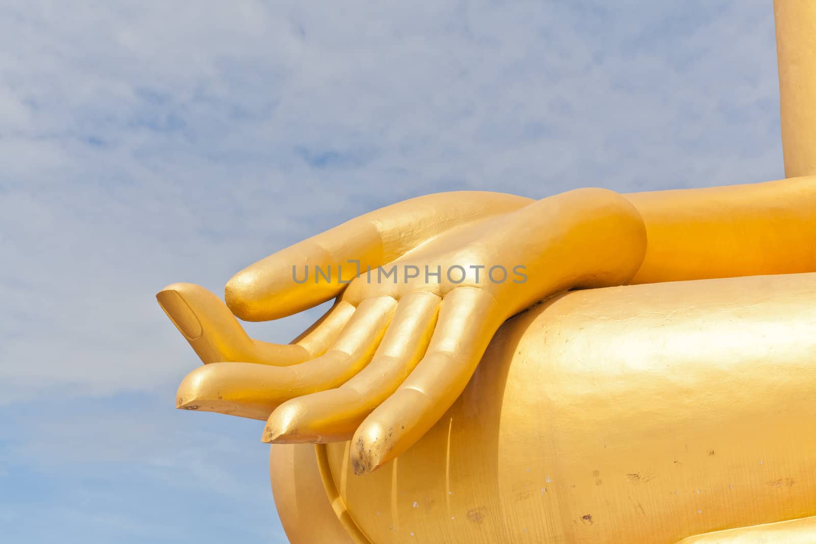 Big Golden Buddha hand statue in Thaland temple