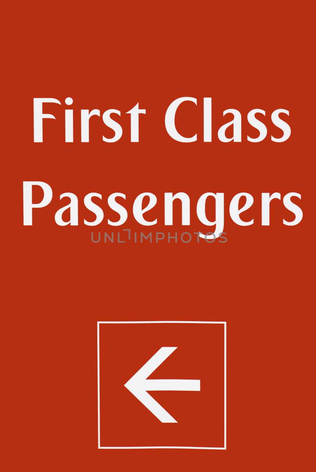 First class passenger sign at airport on a red background, signified priority, wealth, and power.