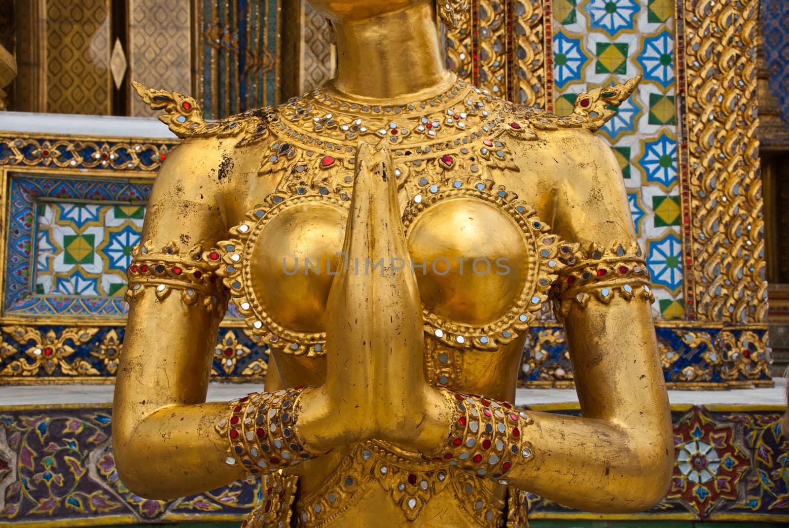 Golden female Garuda body shot at the grand palace, Bangkok, Thailand