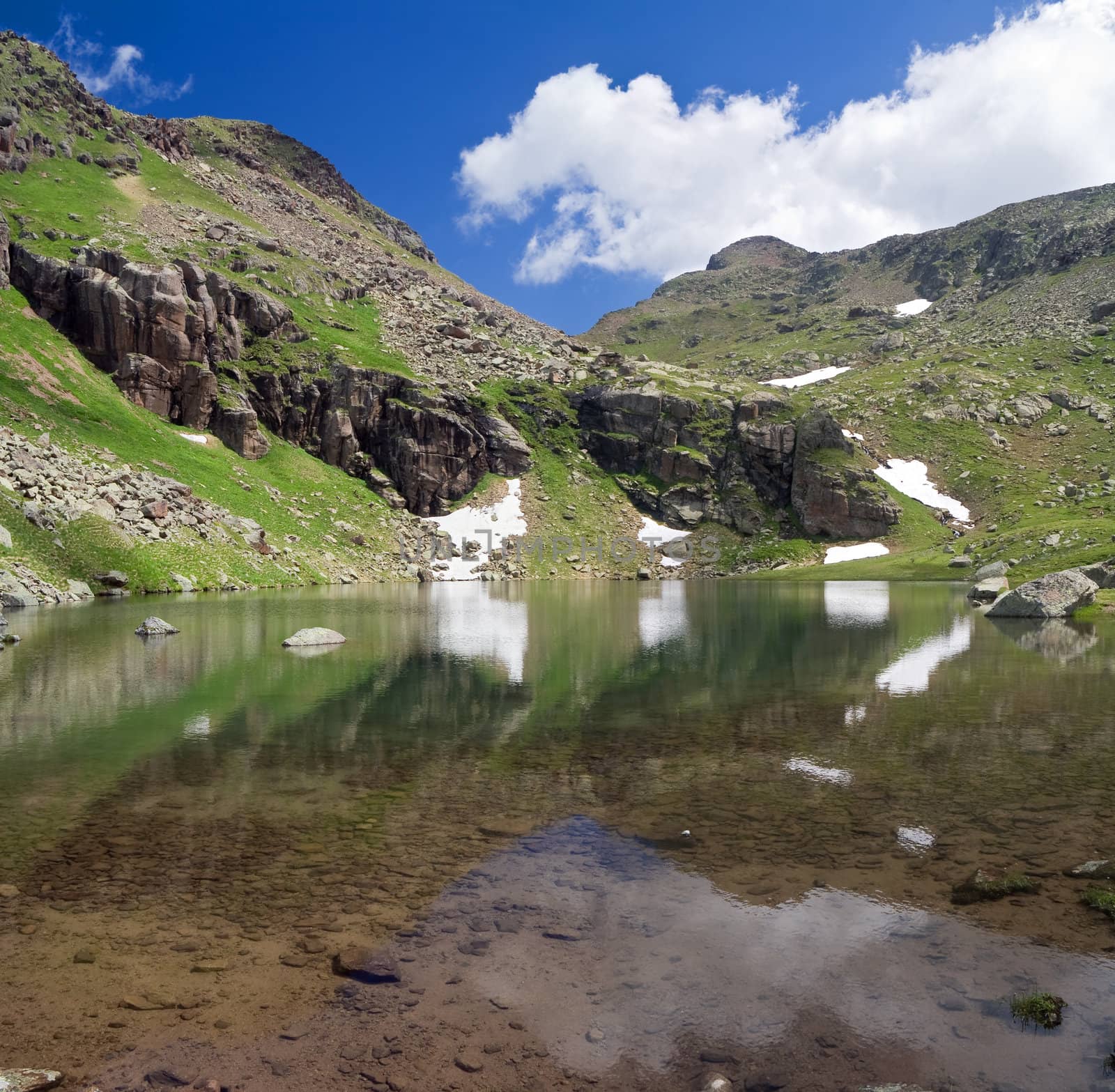 summer view of Lusia lakes, in val di Fassa, Italian dolomites. Photo taken with polarized filter
