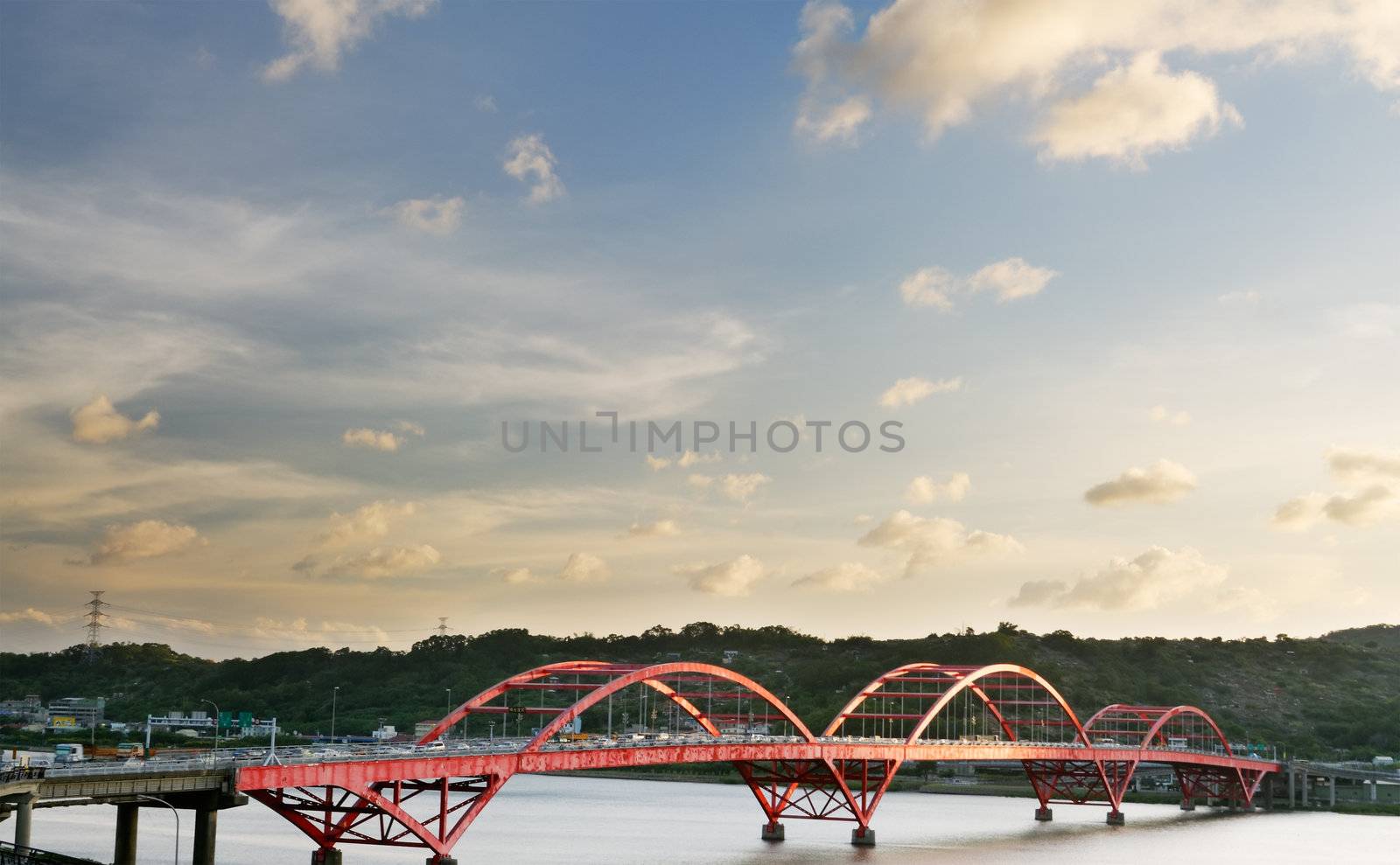 It is a beautiful cityscape of bridge with blue sky.