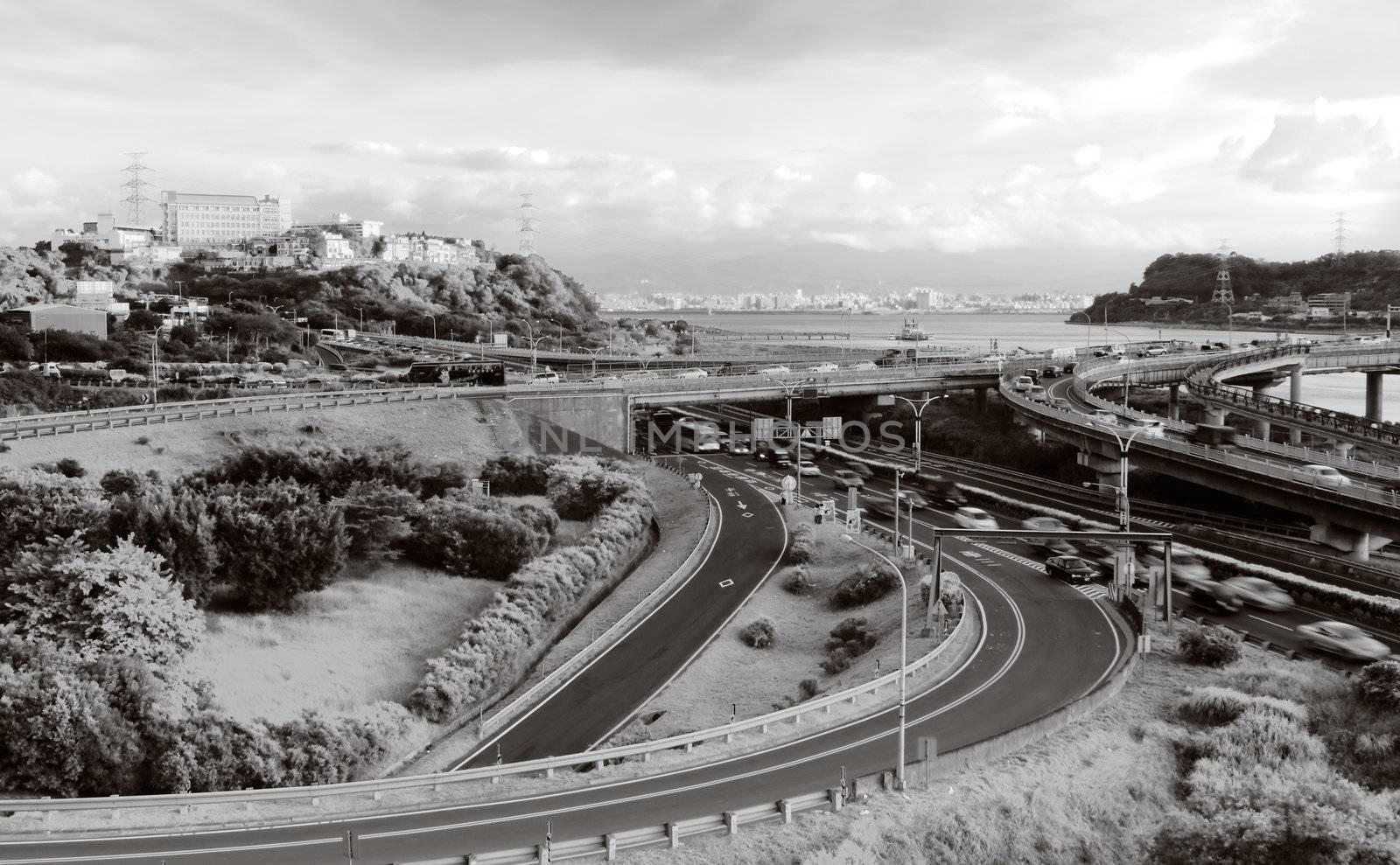 It is a beautiful cityscape of interchange and cars.