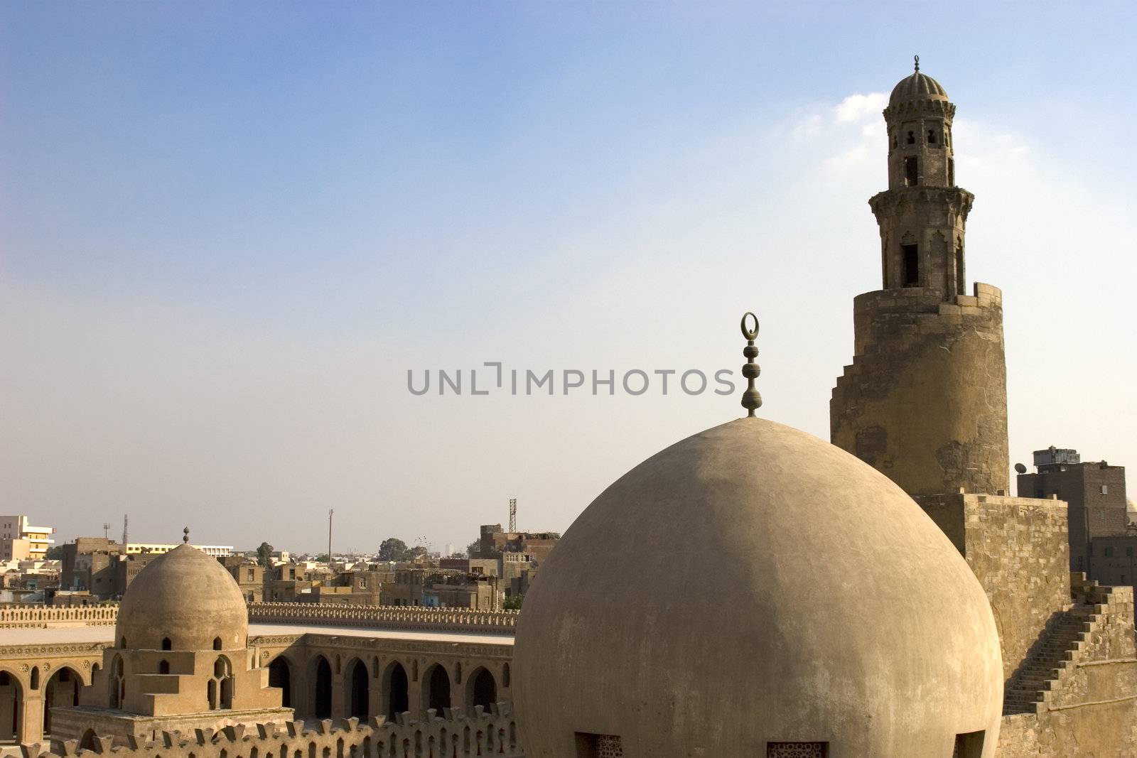 The Mosque of Ahmad Ibn ?ulun is located in Cairo, Egypt. It is arguably the oldest mosque in the city surviving in its original form, and is the largest mosque in Cairo in terms of land area. The mosque was commissioned by Ahmad Ibn Tulun, the Abbassid governor of Egypt from 868�884