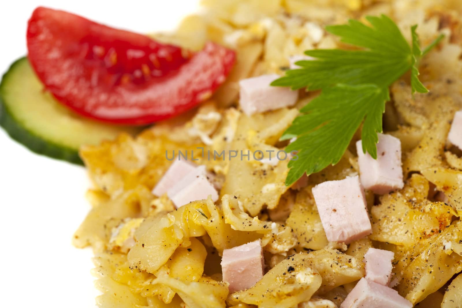 closeup of a pasta dish with ham