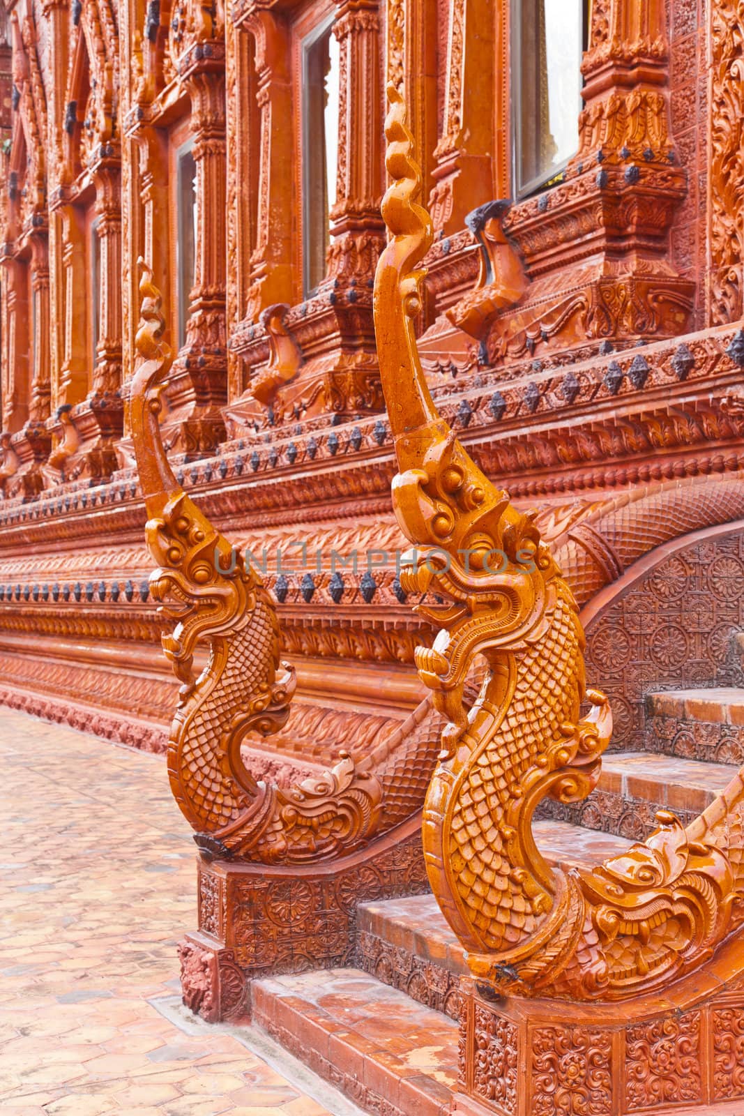 Naga head Thai sculpture made from glazed tile, in Thailand Temple