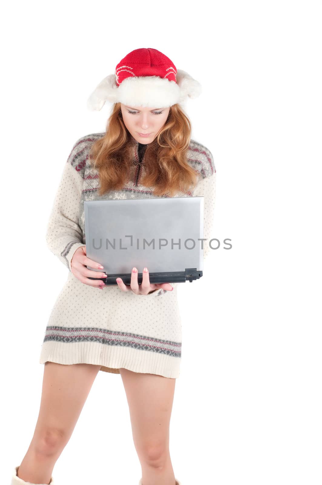 Woman with notebook in red santa hat