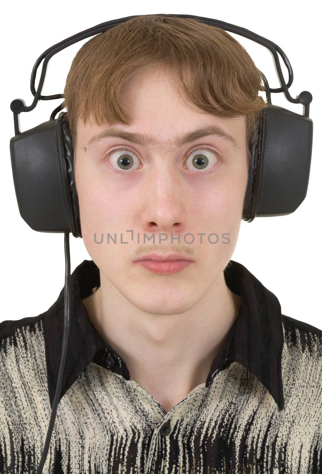 The amusing young man in ear-phones with protruding eyes