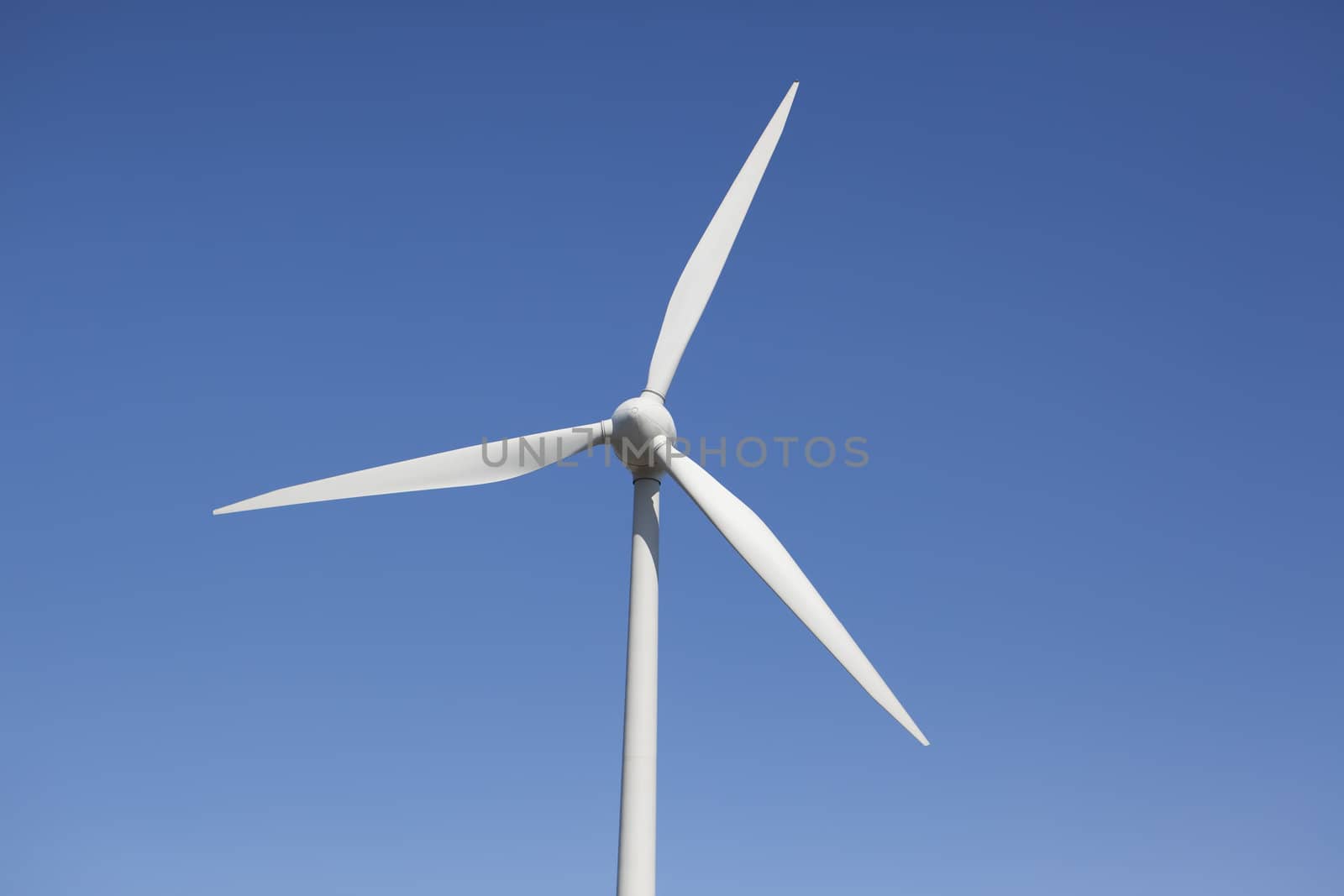 Close up of a wind turbine at a wind farm