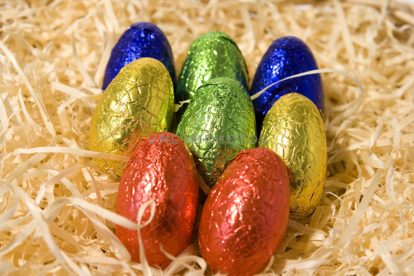 Selection of rainbow colour Chocolate Easter Eggs