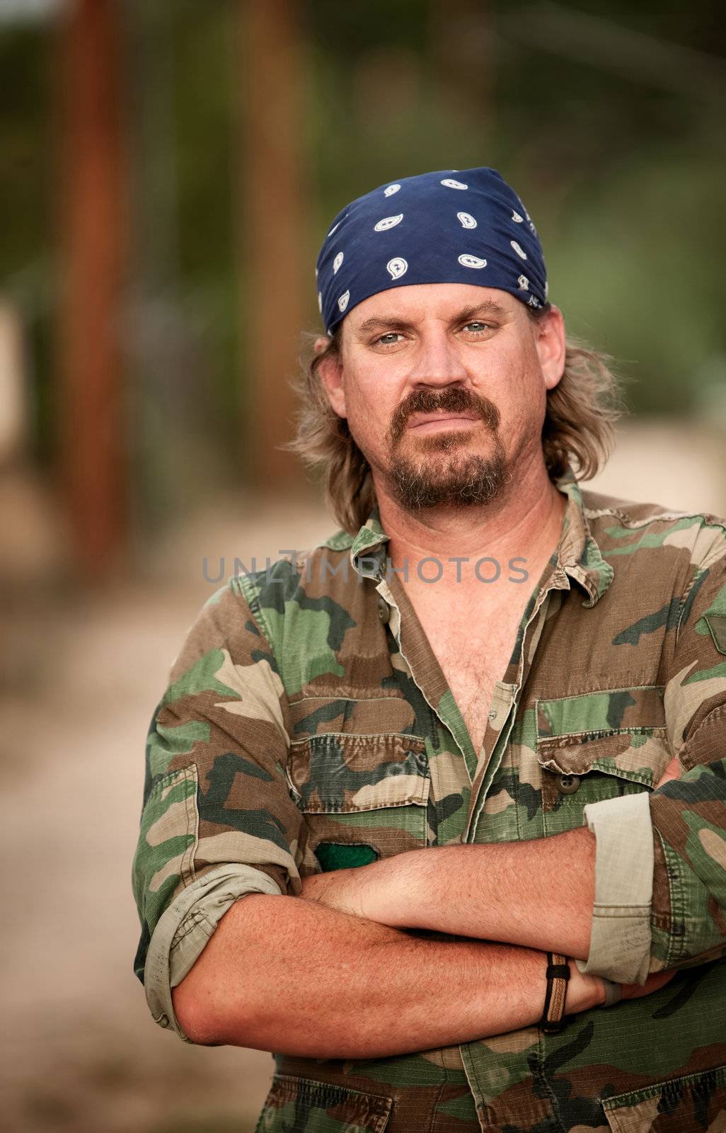 Portrait of rugged man in camoflauge jacket