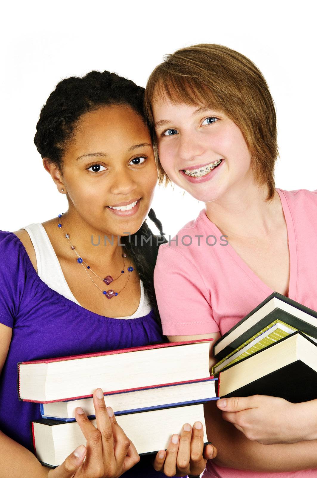 Girls holding text books by elenathewise
