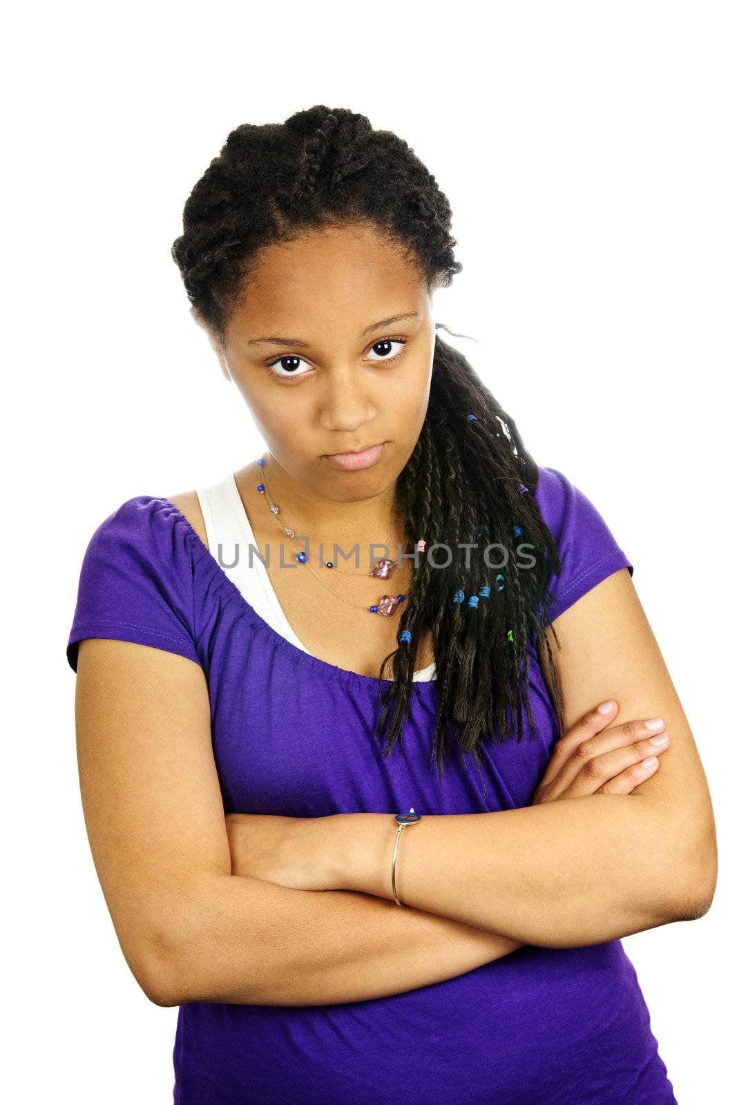Isolated portrait of beautiful black teenage girl pouting