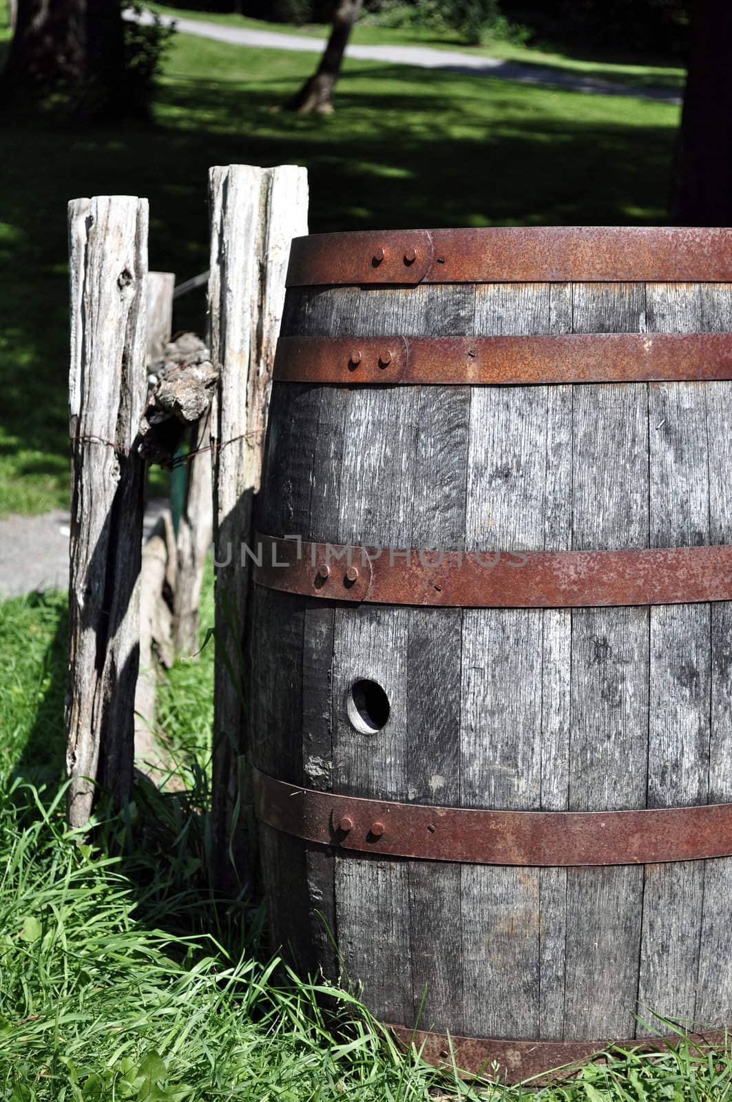 Old wood barrel abandoned in rural area