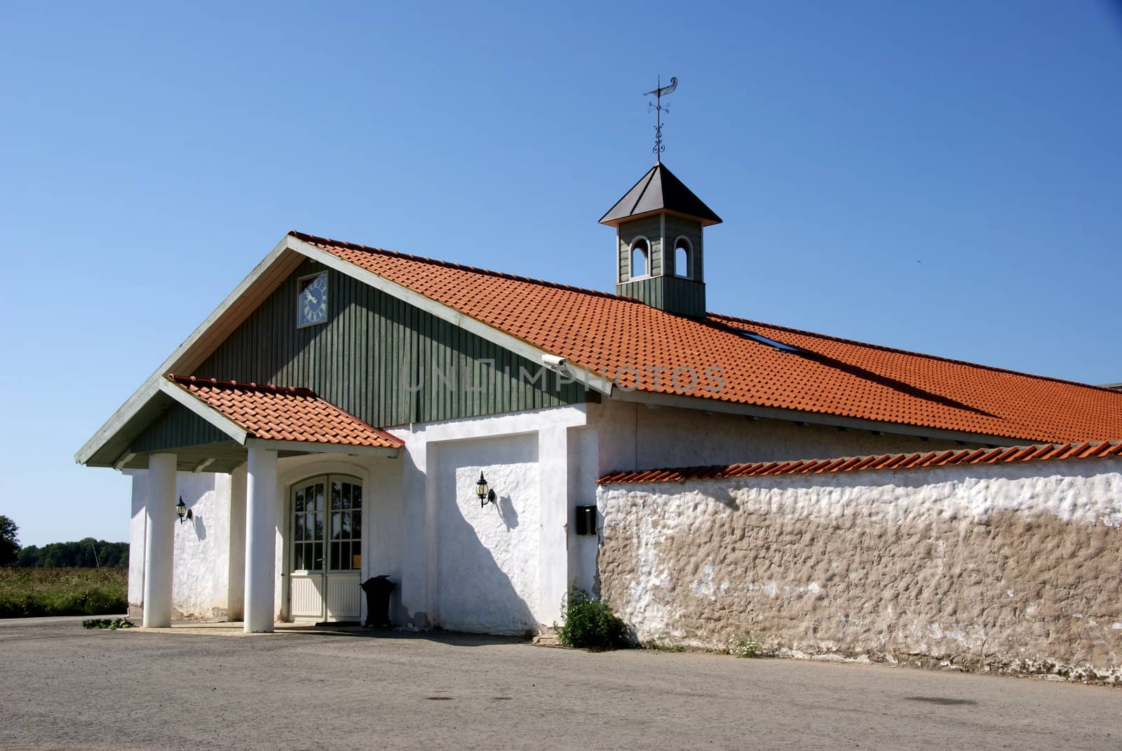 The house from a countryside with a tower and hours