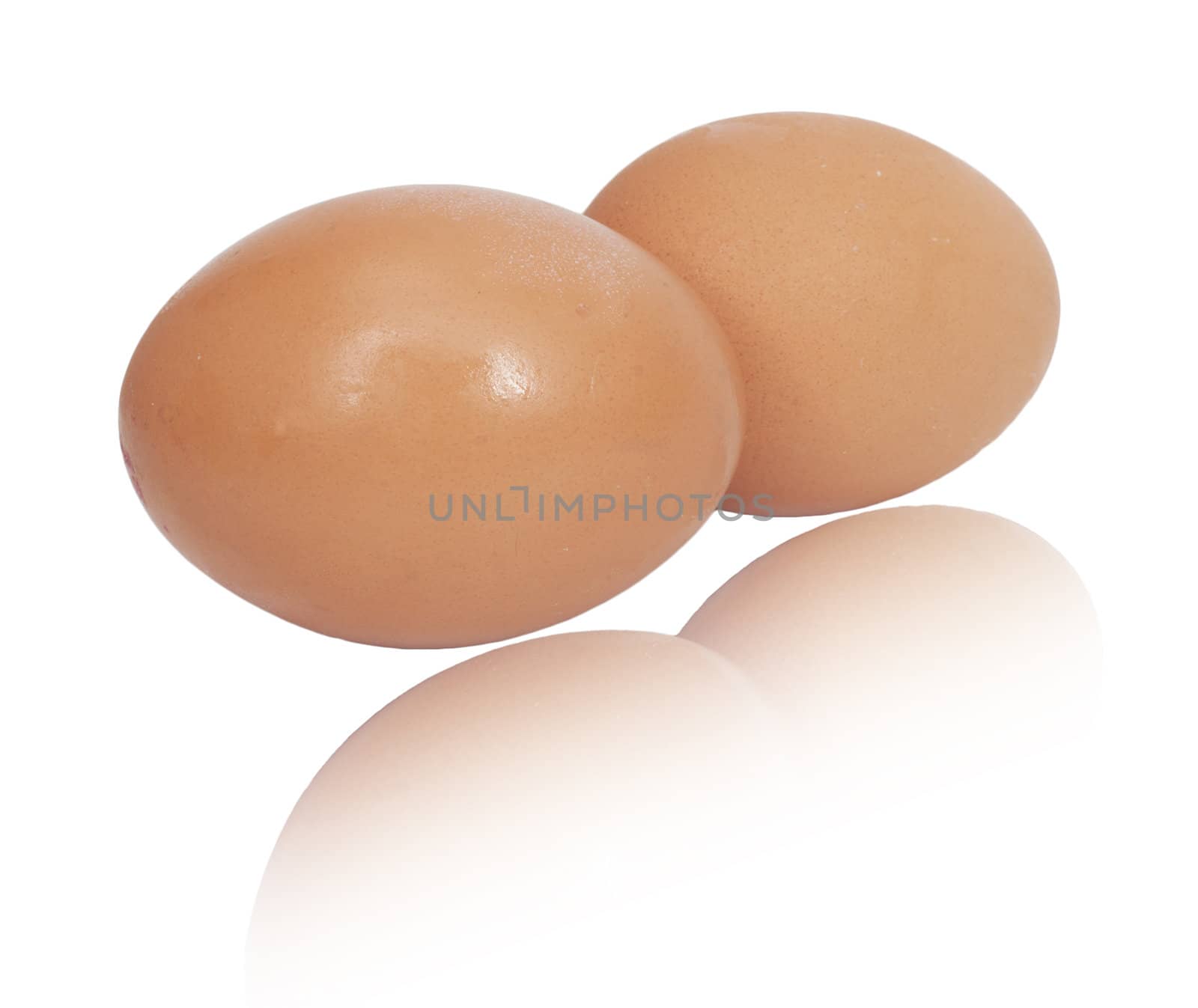 two brown eggs isolated on white background 