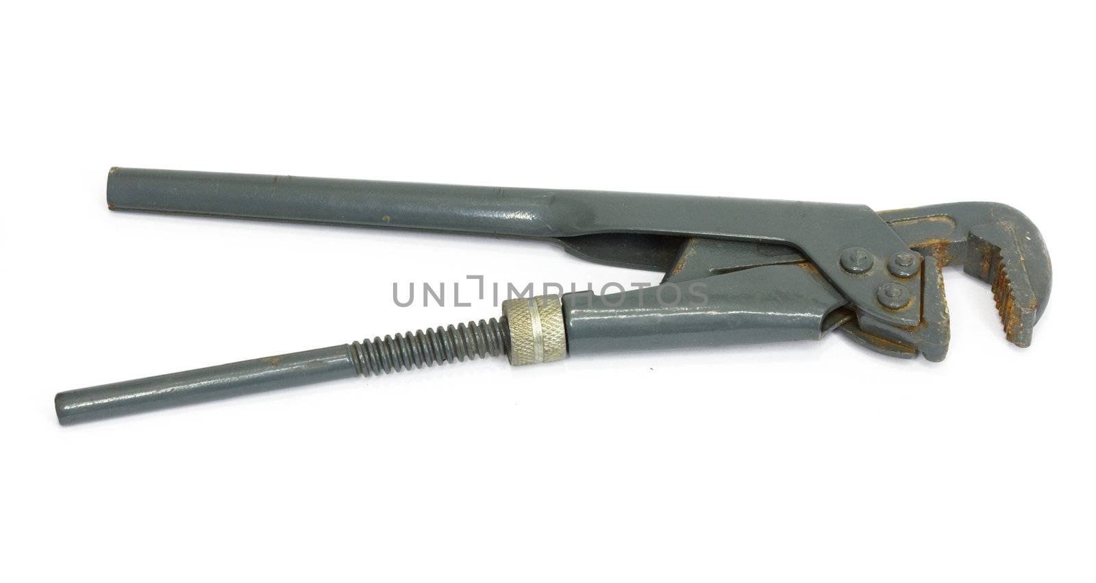 old adjustable spanner under the white background 