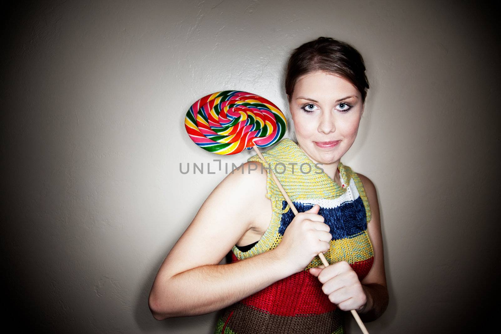 Cute Girl Caught in Spotlight with Lollipop