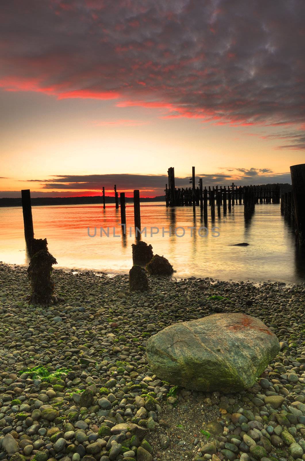 Sunset over pebble beach by neelsky