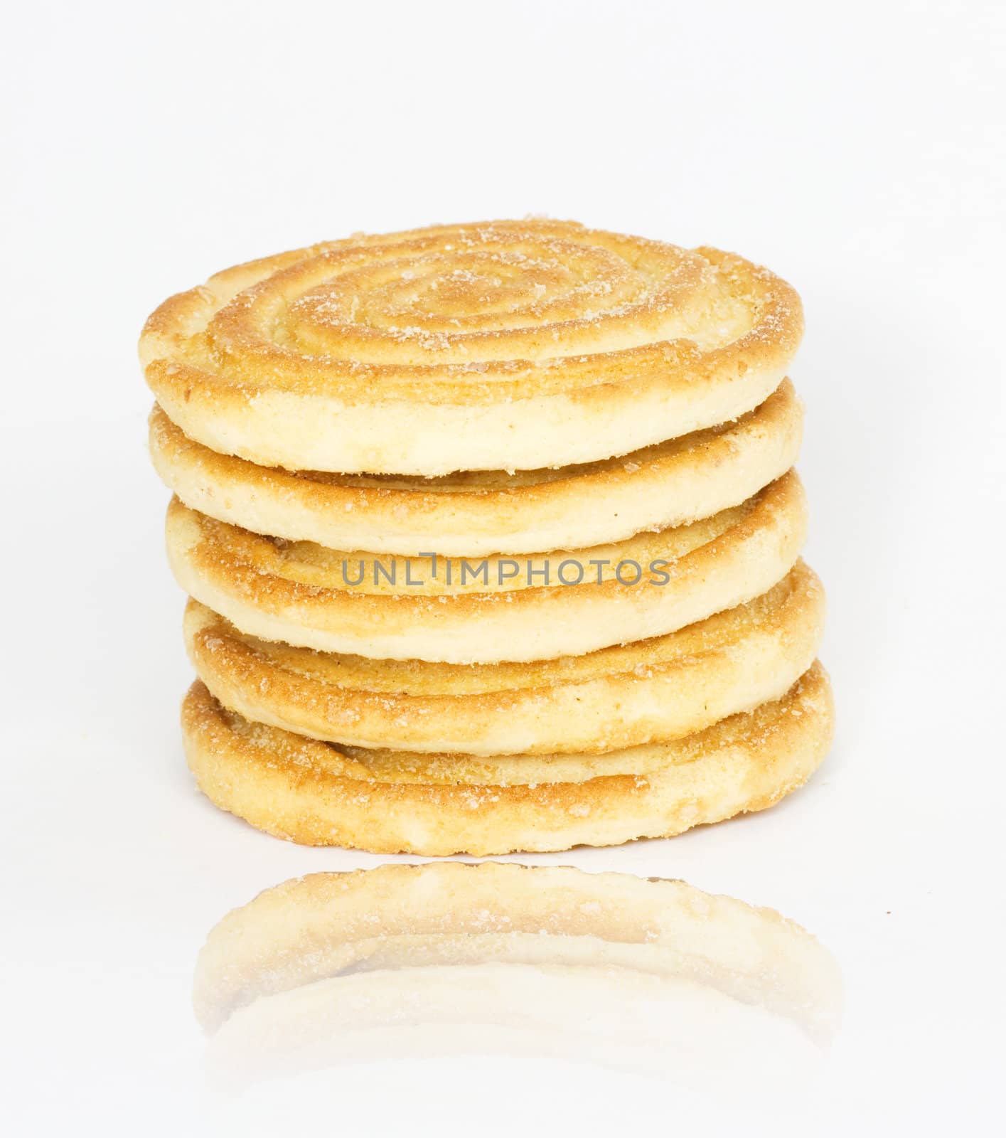 Flapjack chocolate chip cookie stack with one alone, isolated over white background with reflection. 