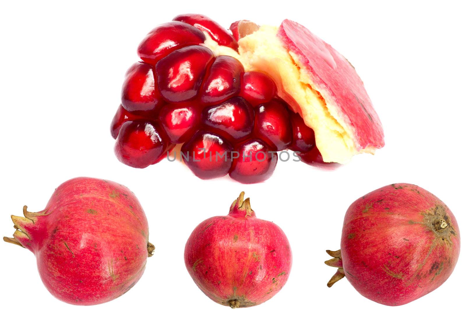 Extreme close up background of a red juicy ripe pomegranate fruit seeds 