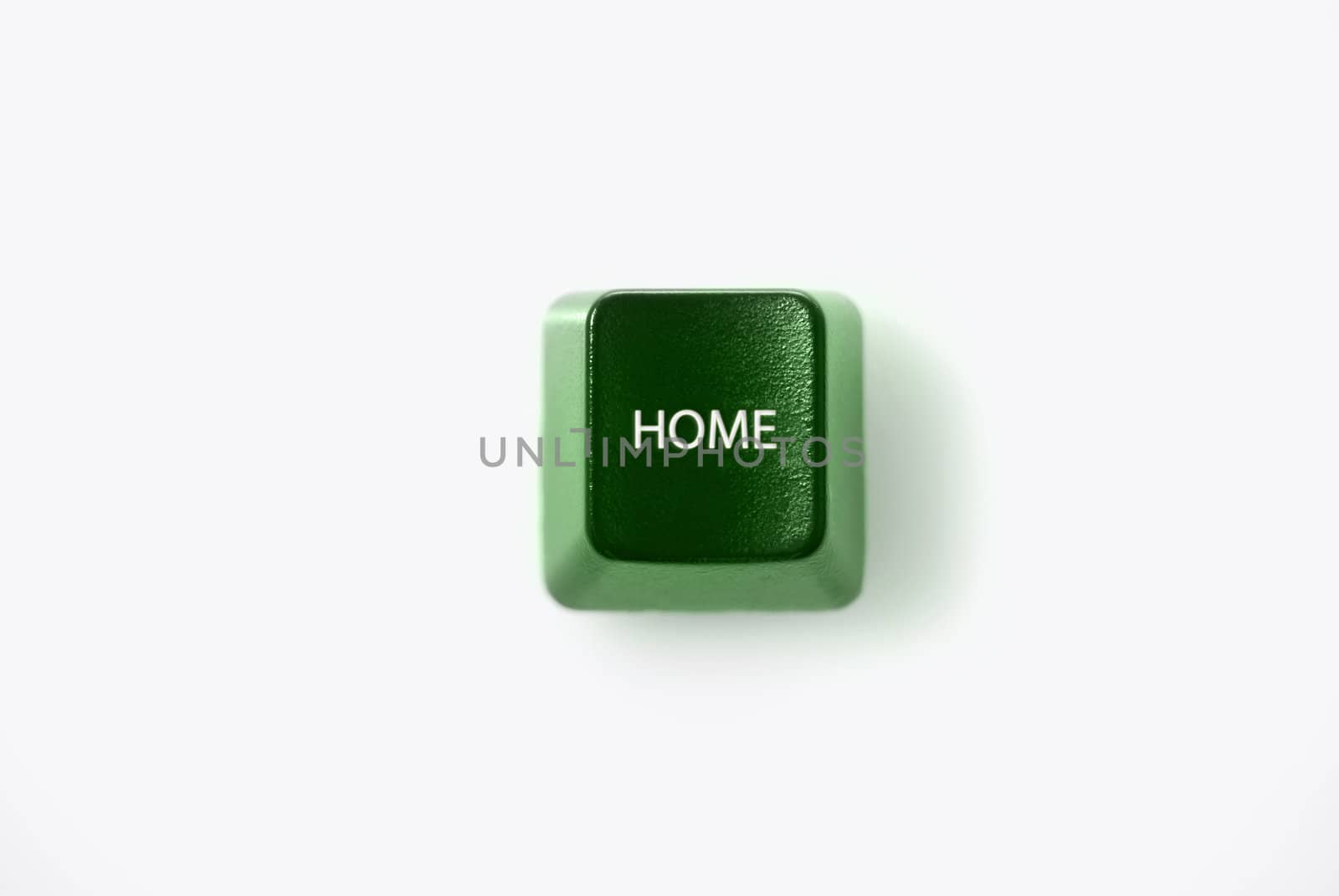 HOME computer key shot against white