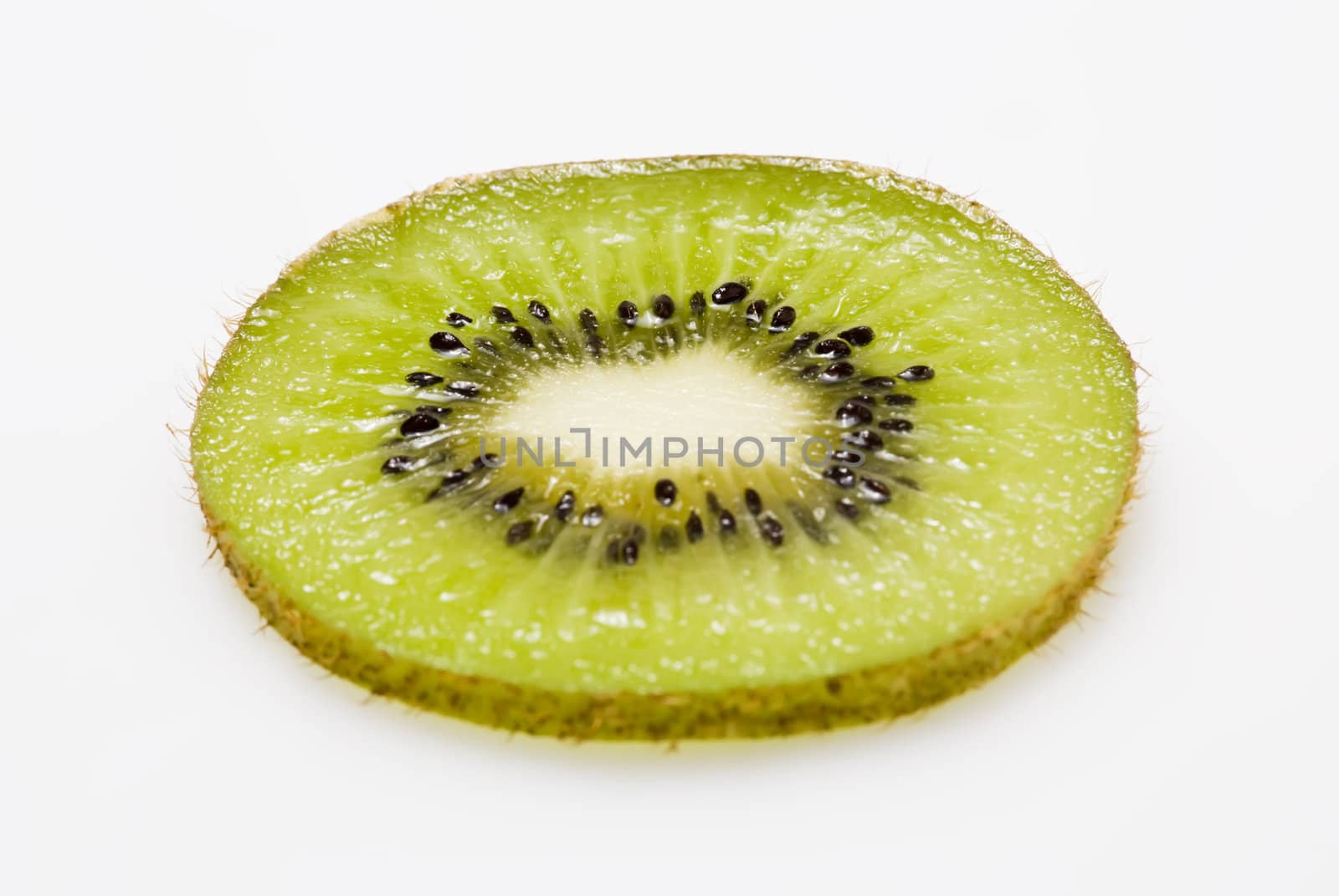 One piece of sliced kiwi fruit on white background