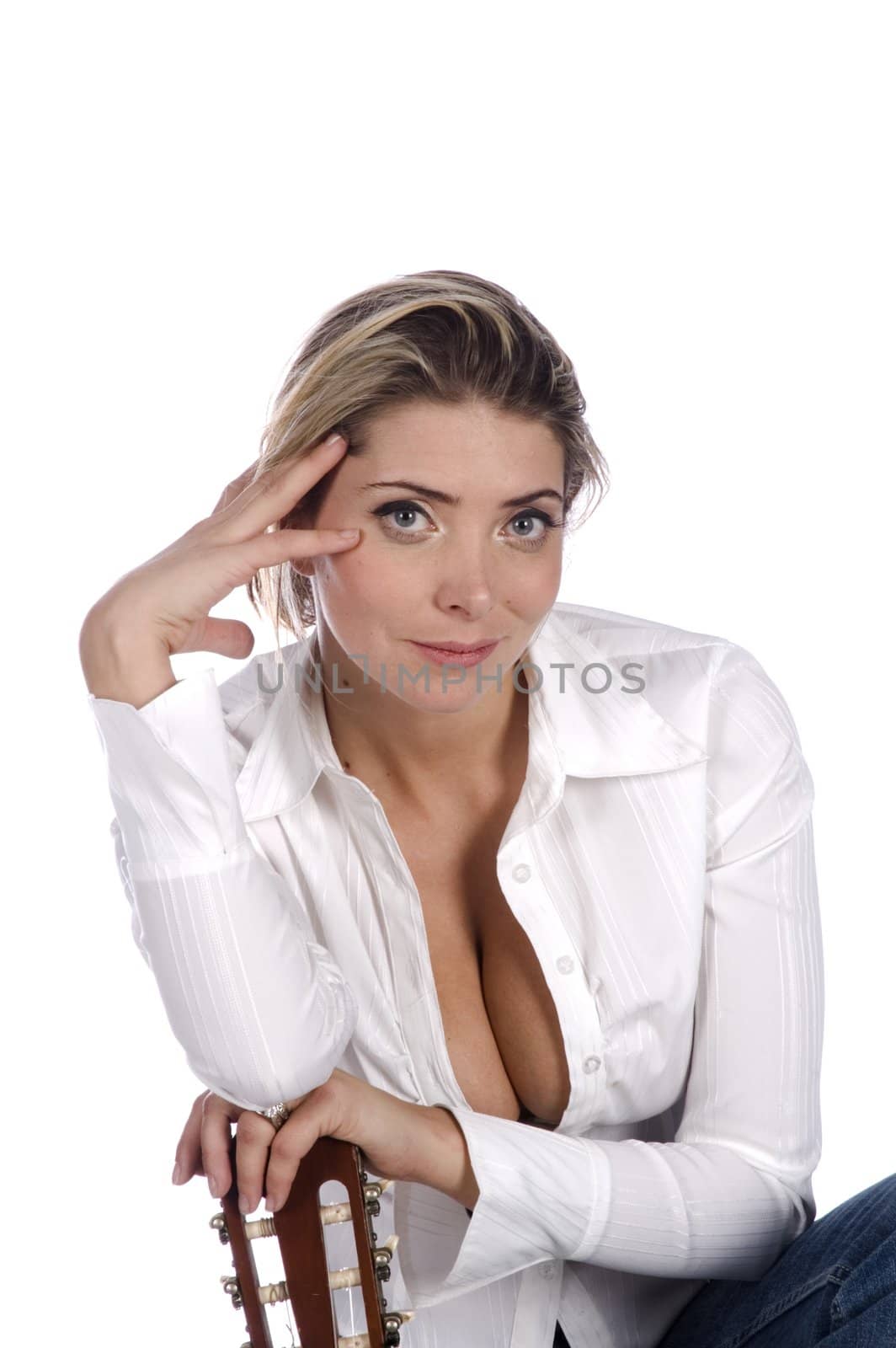 female guitarist smiling on a white background