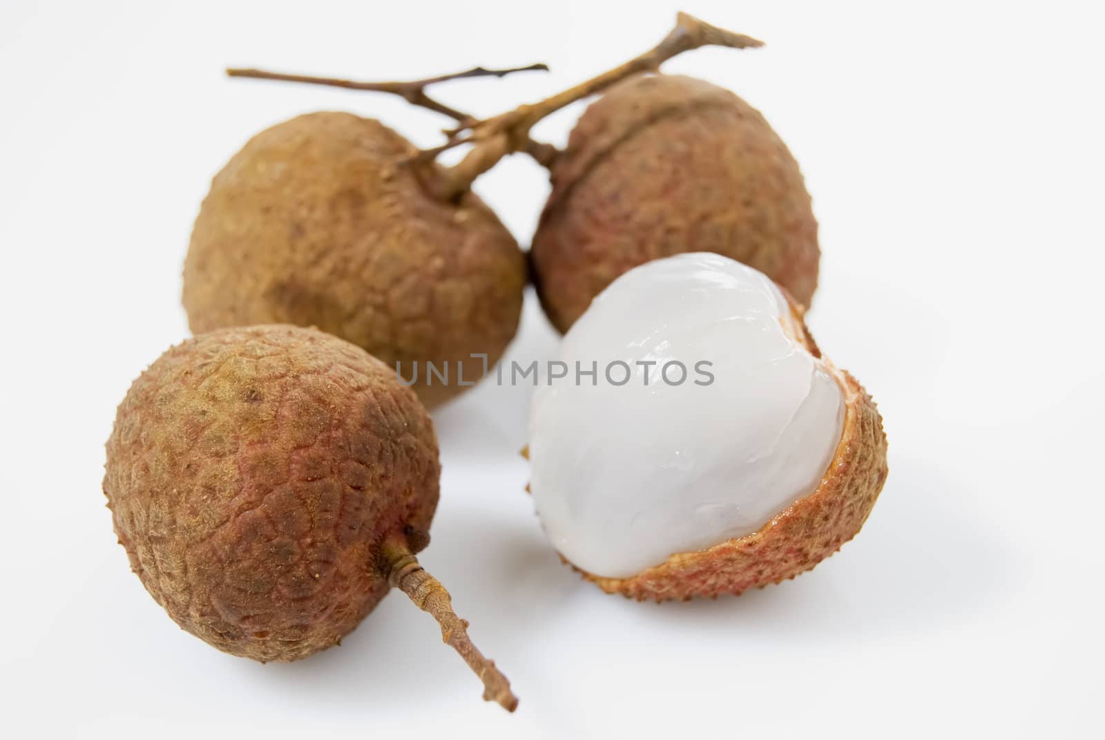 Four pieces of lychees on white background