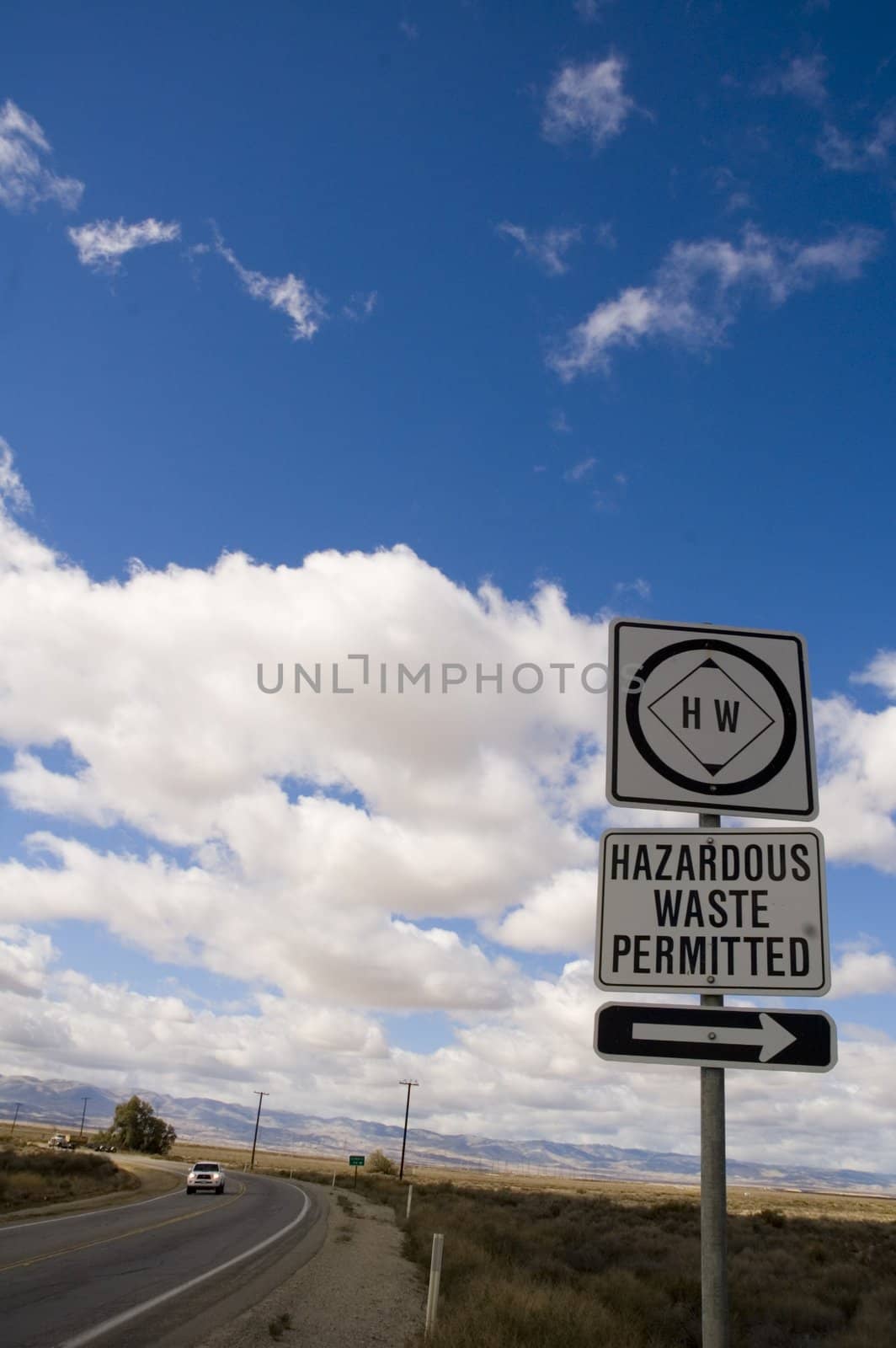 Hazardous waste permitted sign at a dump in the Central Valley of California