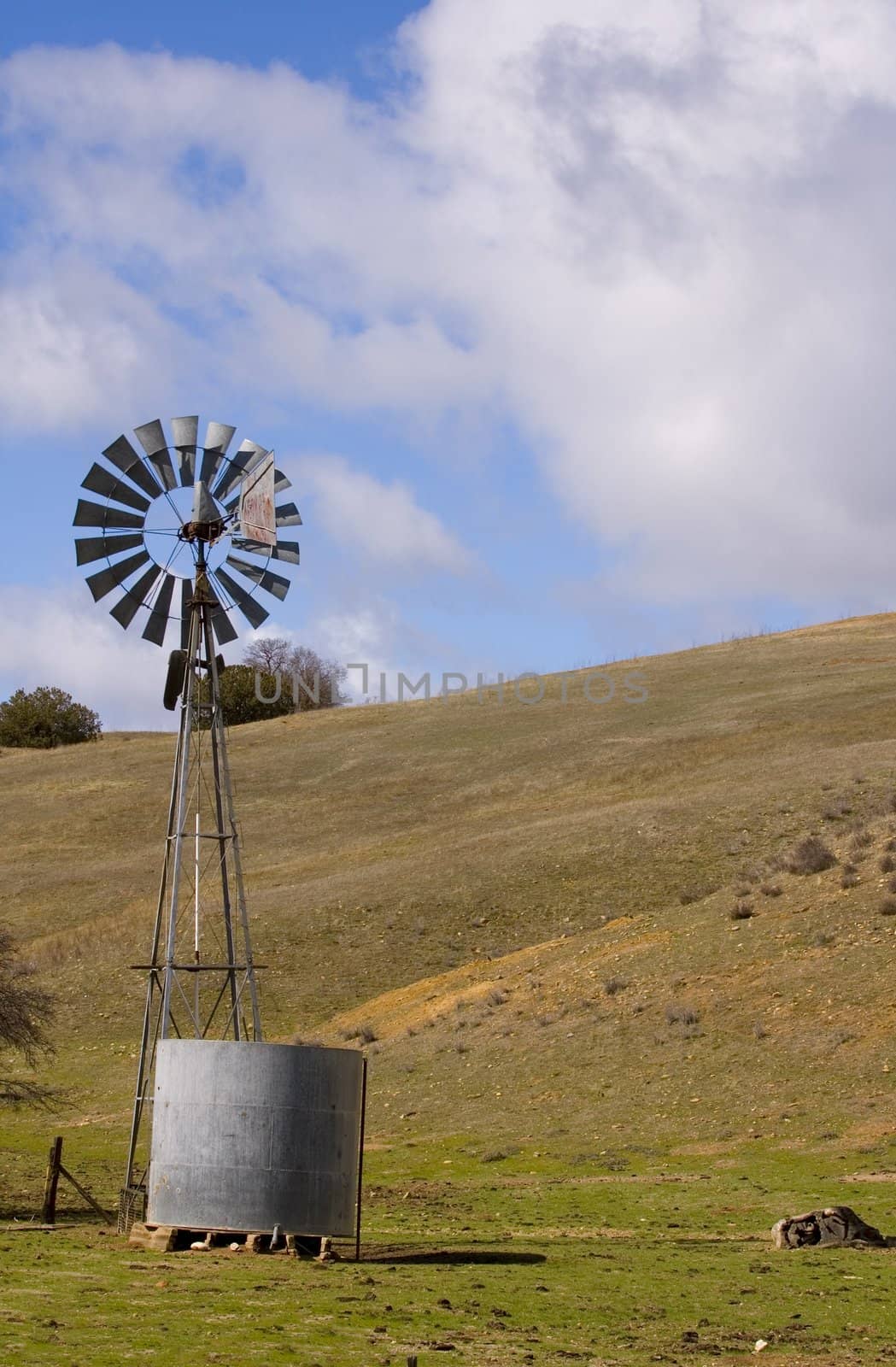 Wind powered pump with water tank by jeffbanke