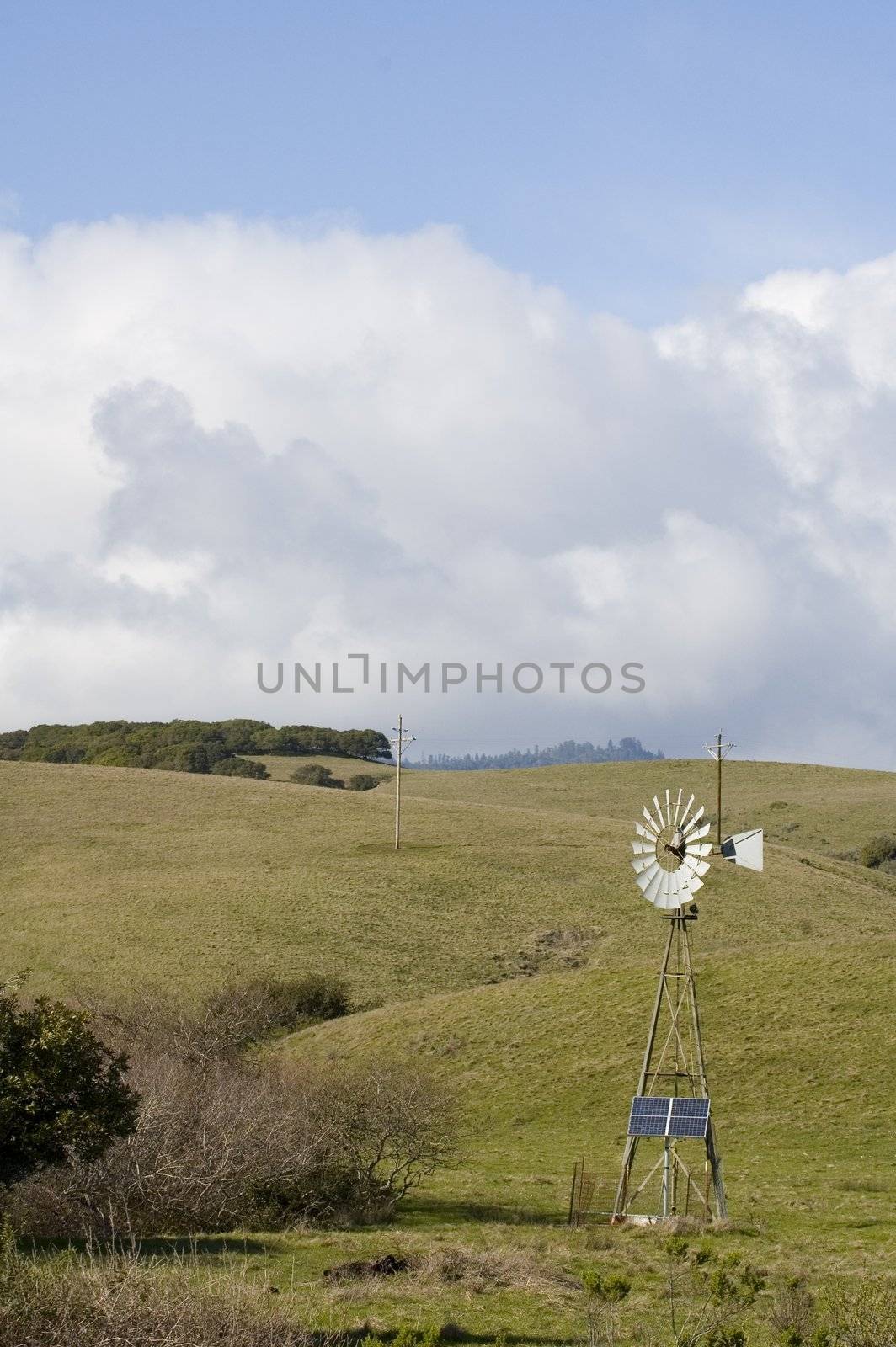 Wind powered pump with solar backup by jeffbanke