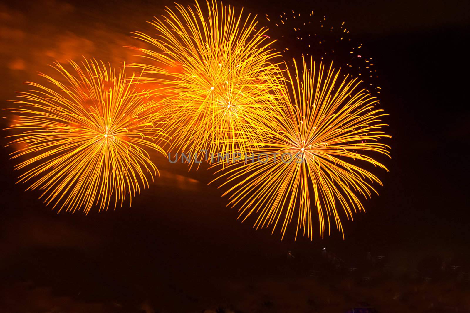 long exposure of multiple fireworks against a black sky