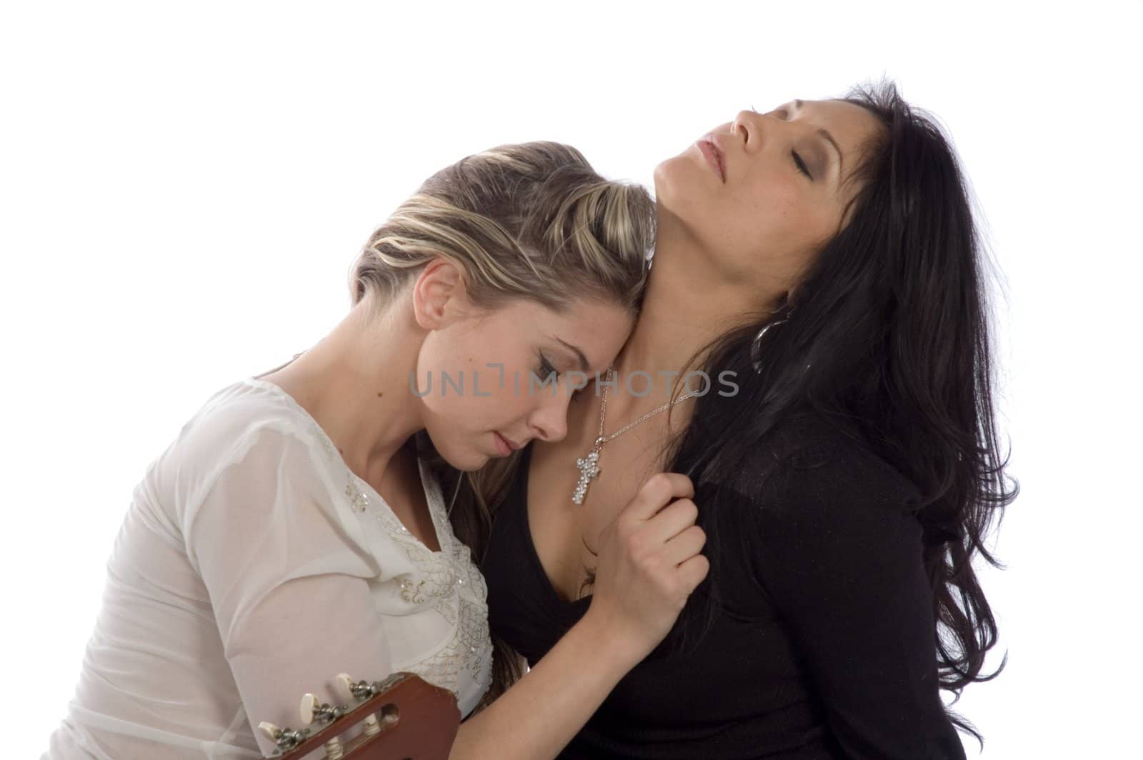 hispanic woman sharing a tender moment with caucasian girl freind isolated over white