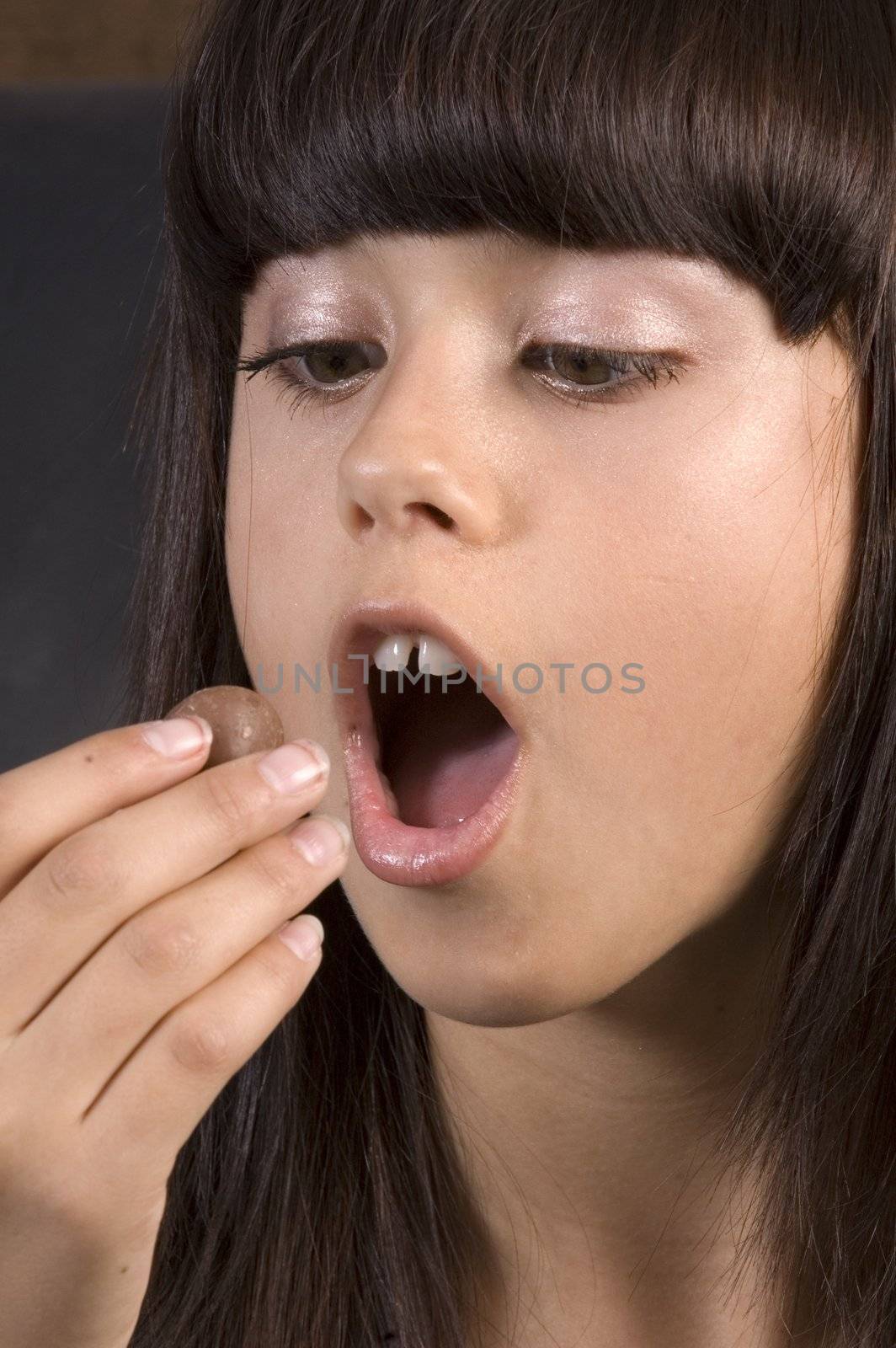 cute caucasian american girl resting head on the hands 