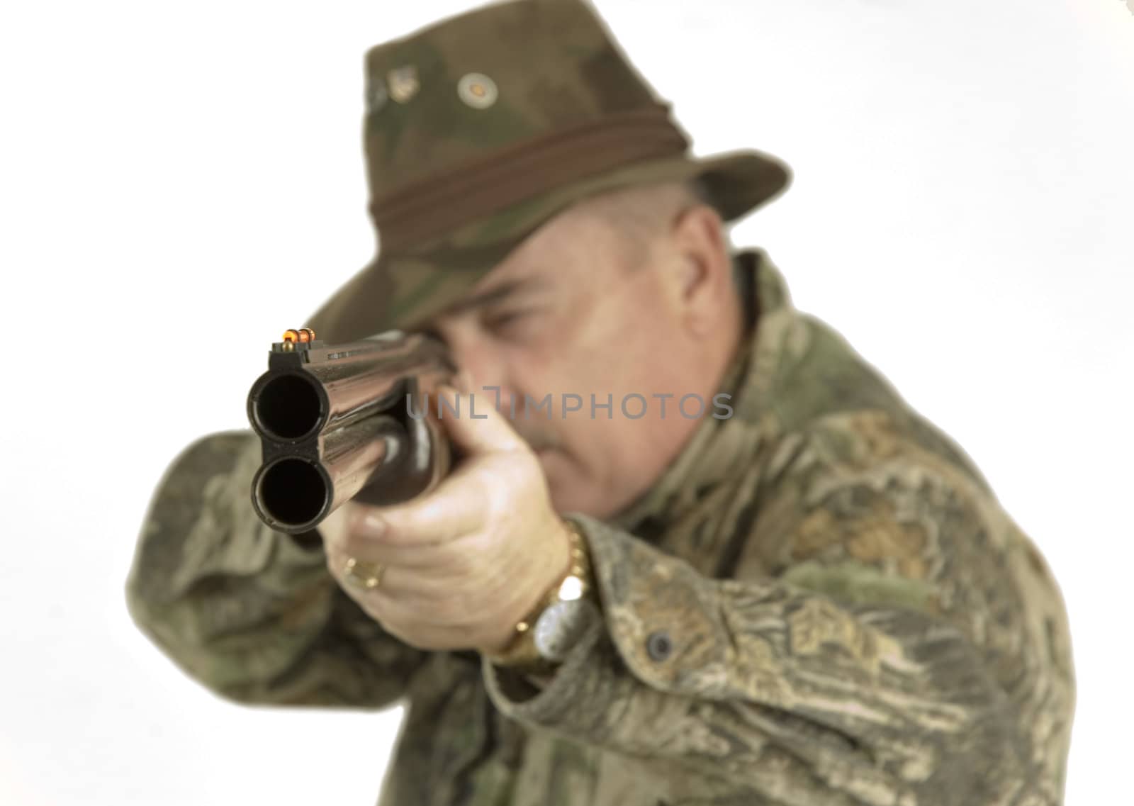 shotgun shooter taking aim over a white background