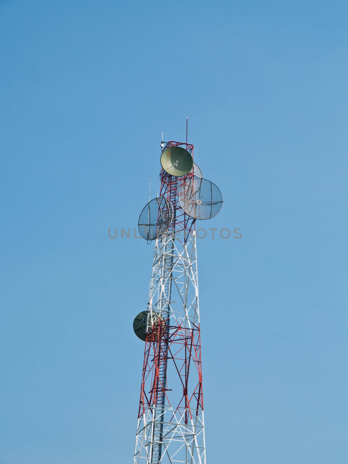 Satellite disc against blue sky