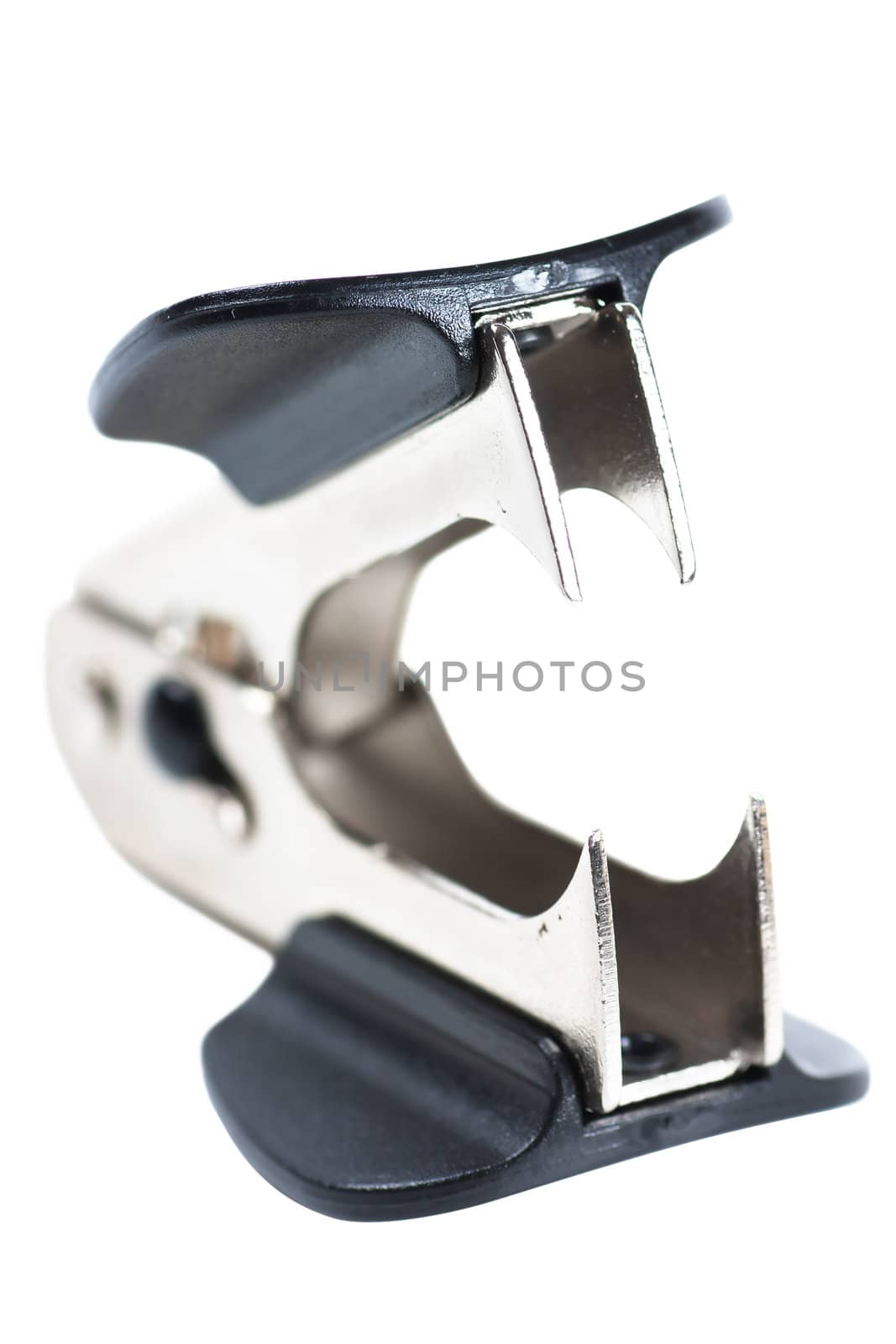Close-up view of staple remover isolated over white background