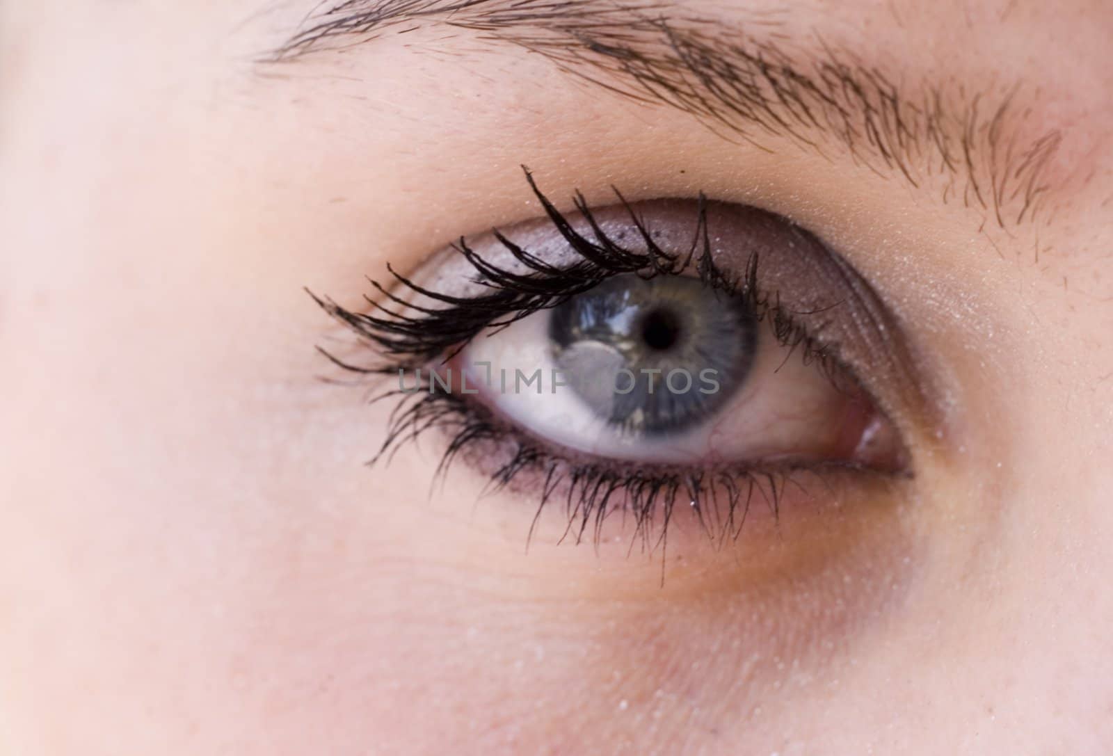 Closeup of a 16 year old girls eye with makeup