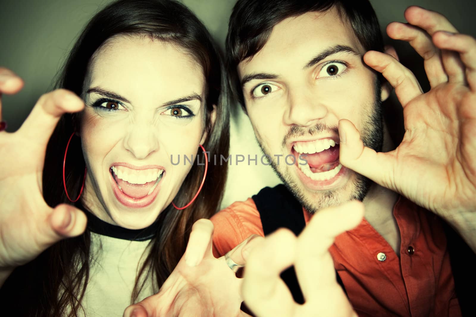 Crazy Couple Using their Hands as Claws