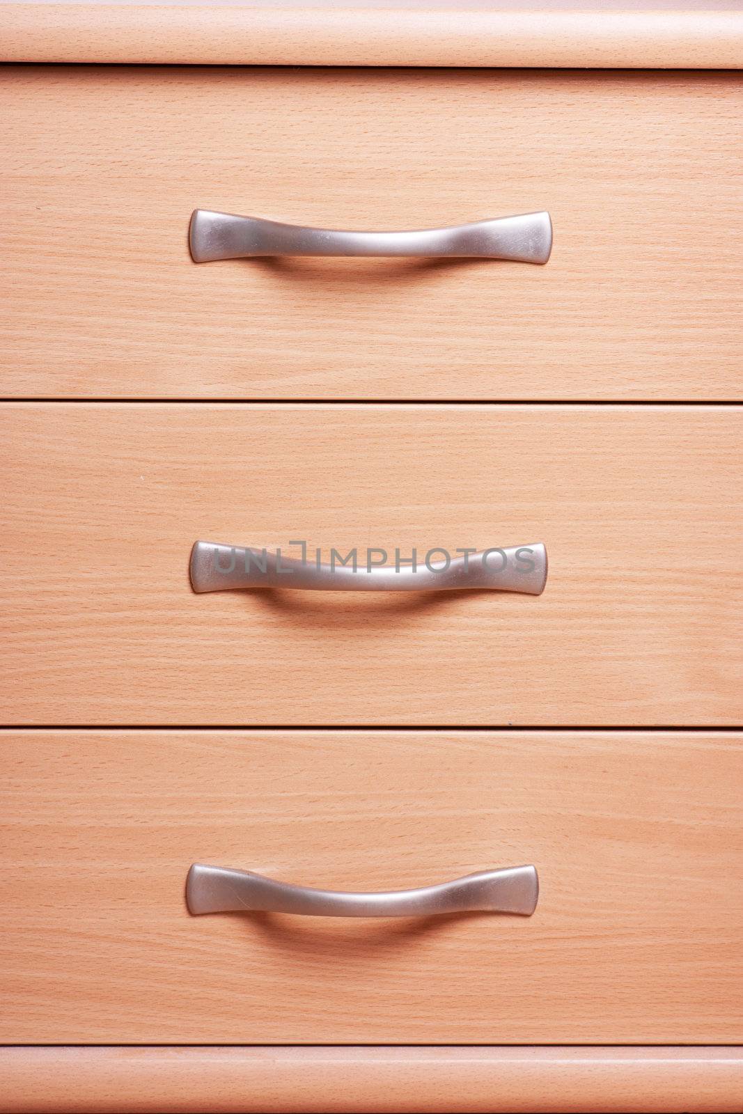 Close up view of drawers of cupboard