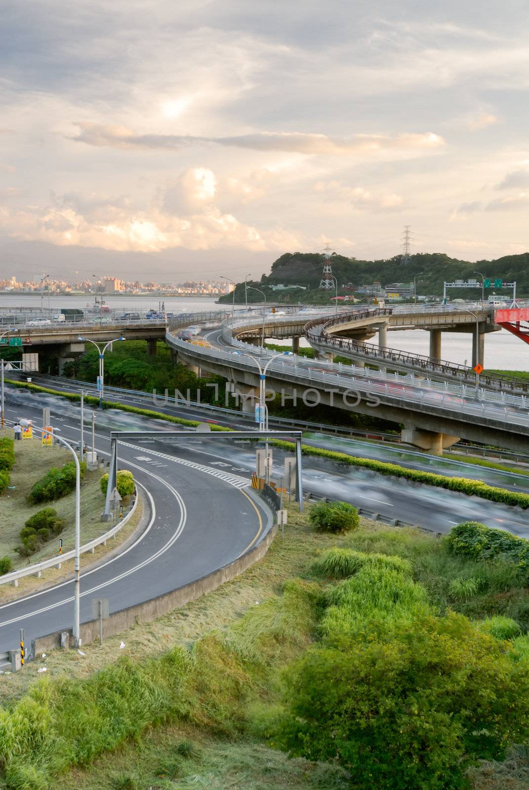 It is a beautiful cityscape of interchange and cars.