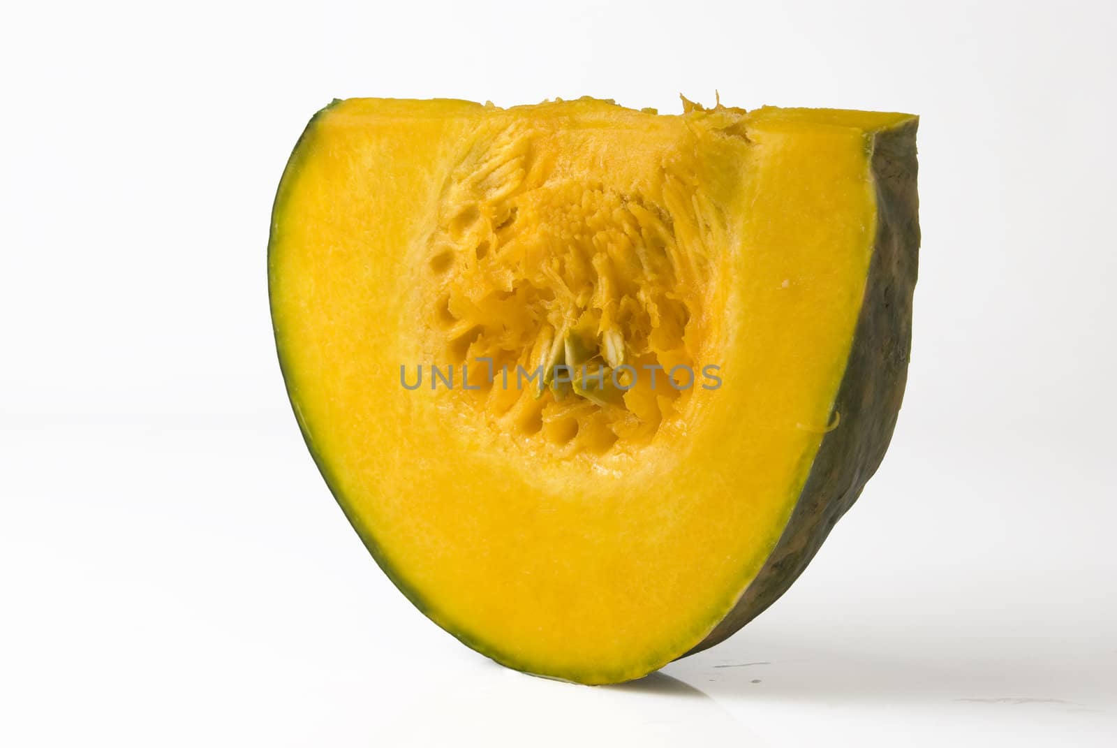 A slice of squash against white background