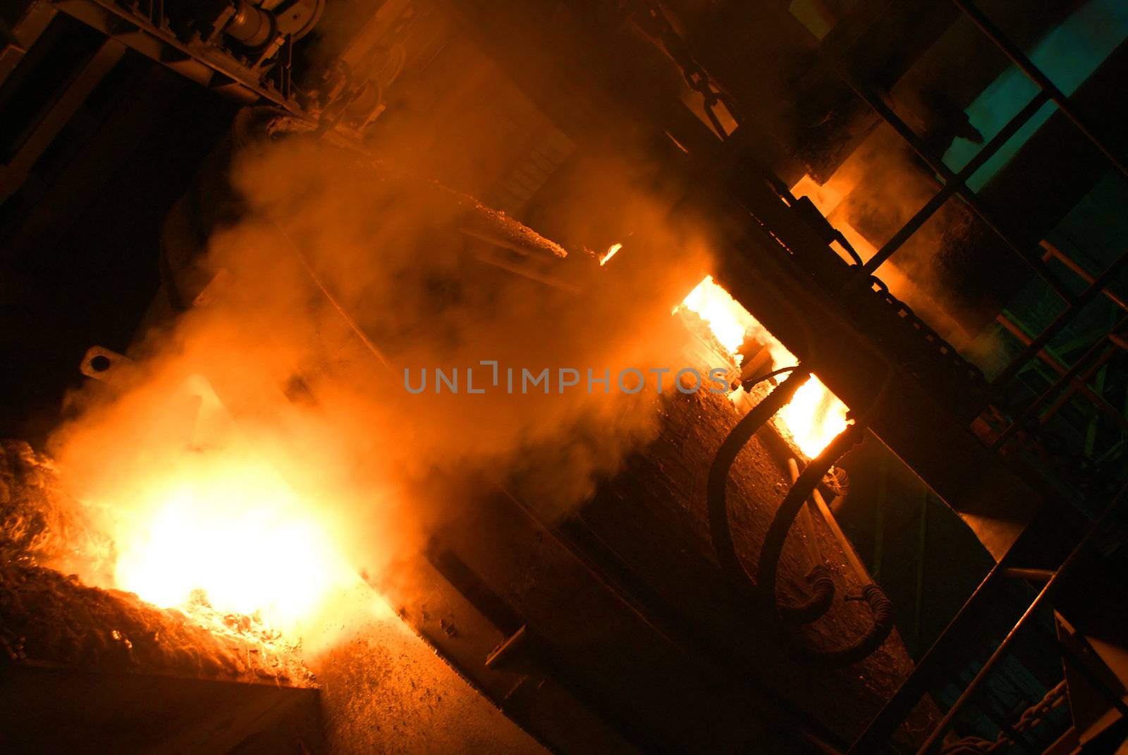 A metal casting into a form on a foundry