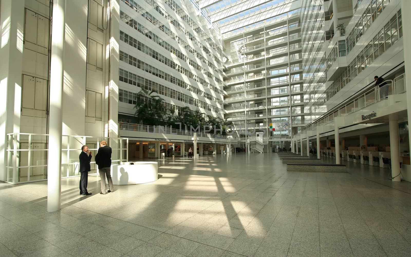 Civil servants talking in city hall of The Hague, Holland