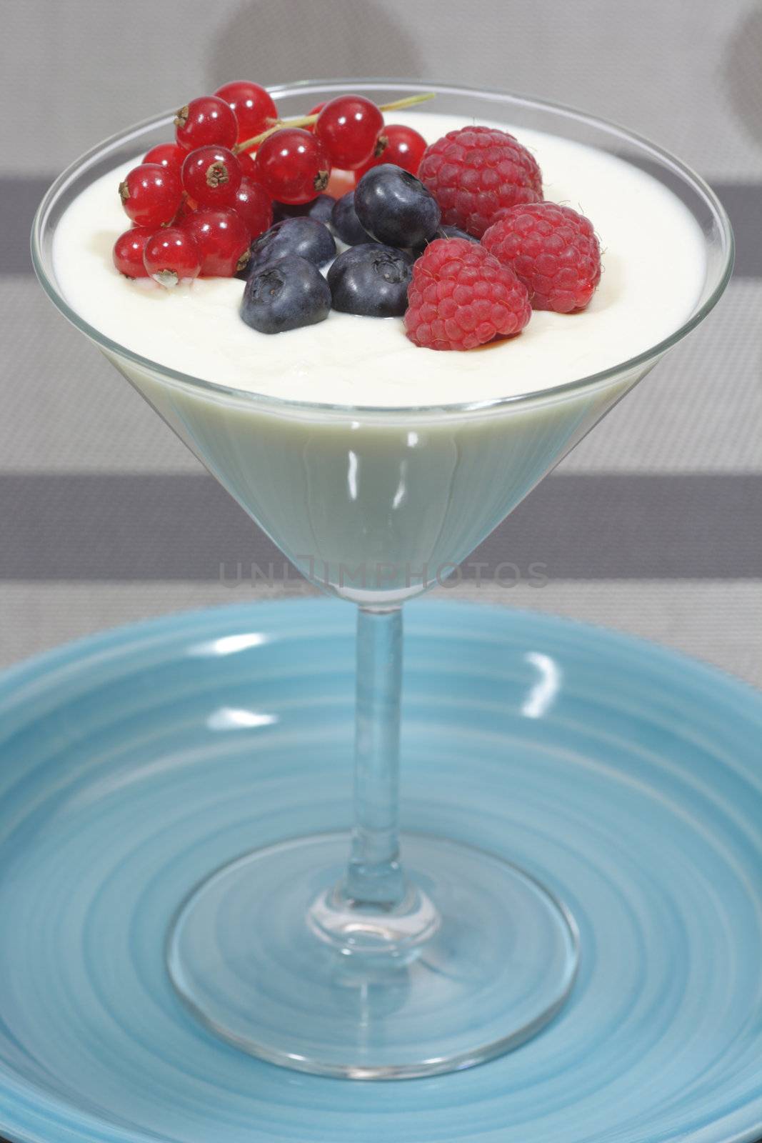 Dessert with fresh berries in a glass