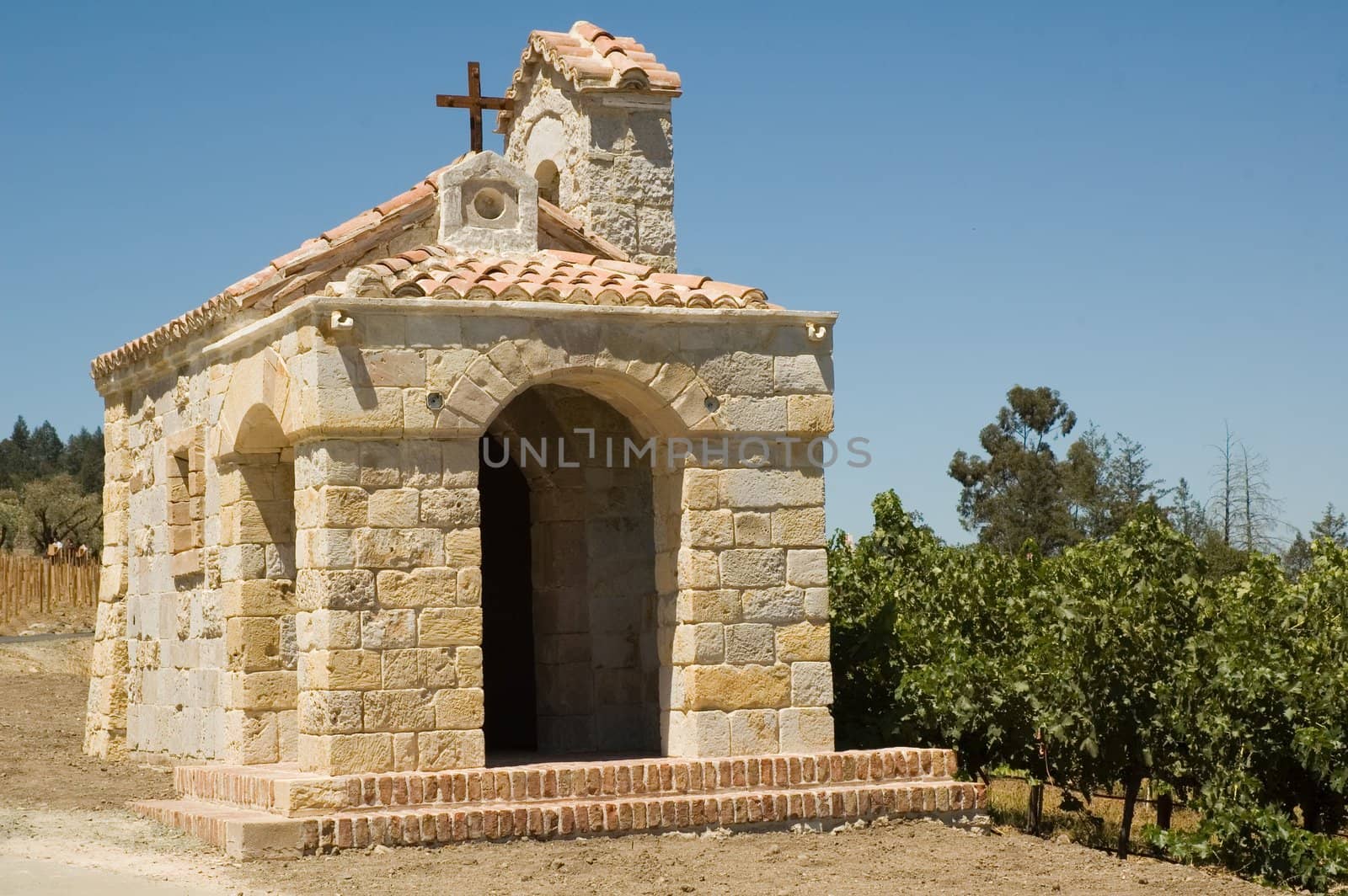 A stone chapel in a vineyard setting in Northern california