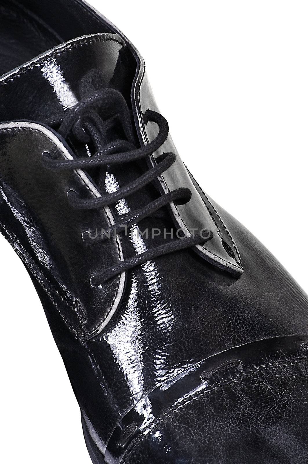 Man's black low shoes on a white background