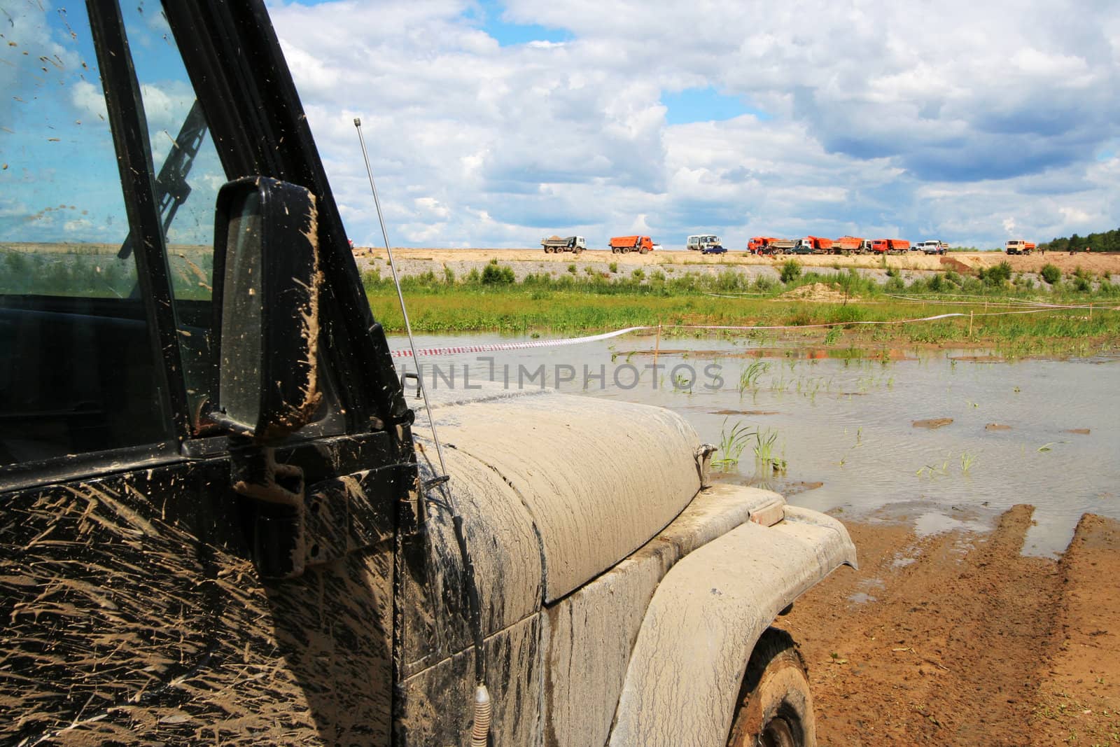 The dirty car at a under construction road